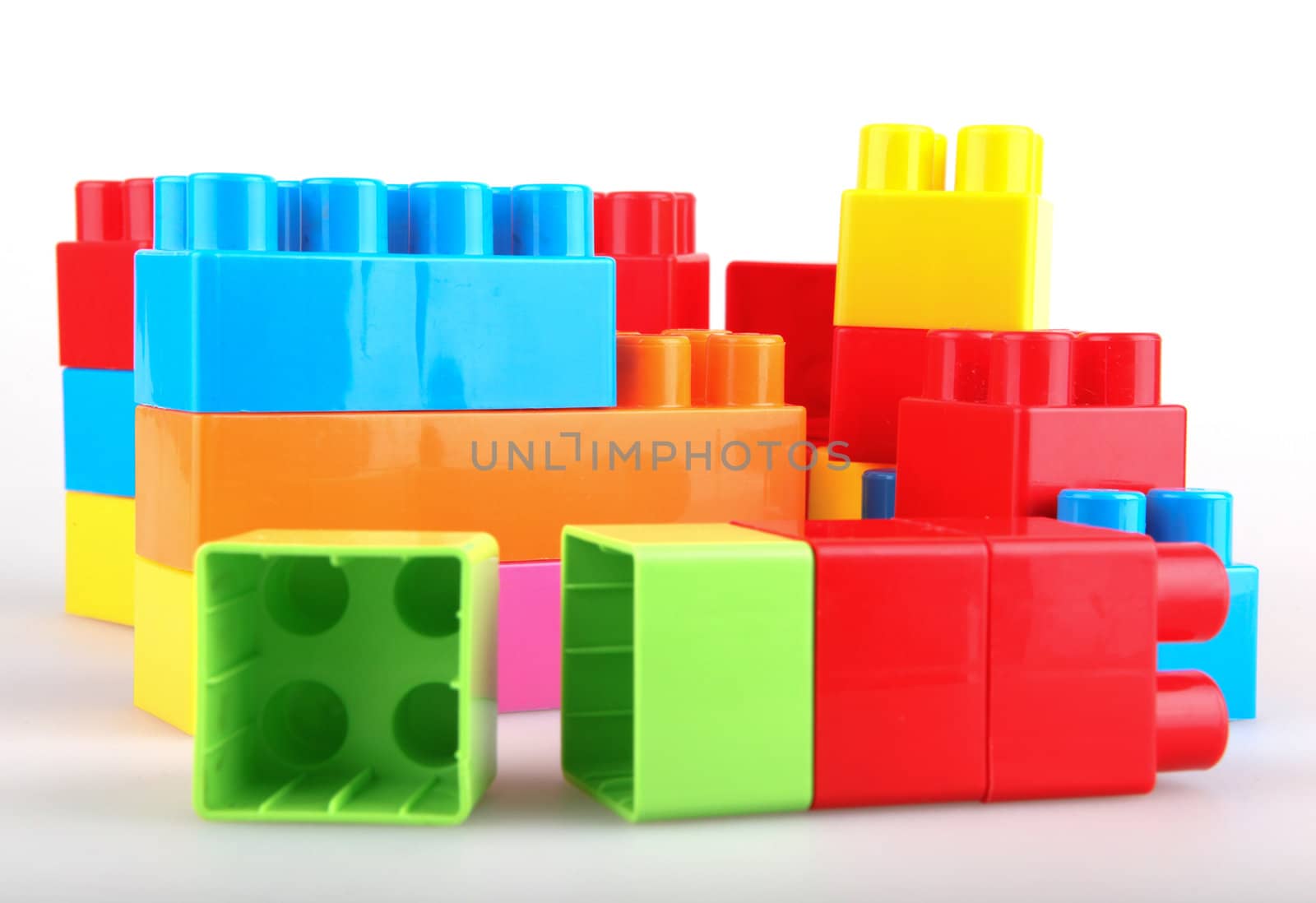 Plastic building blocks on a white background