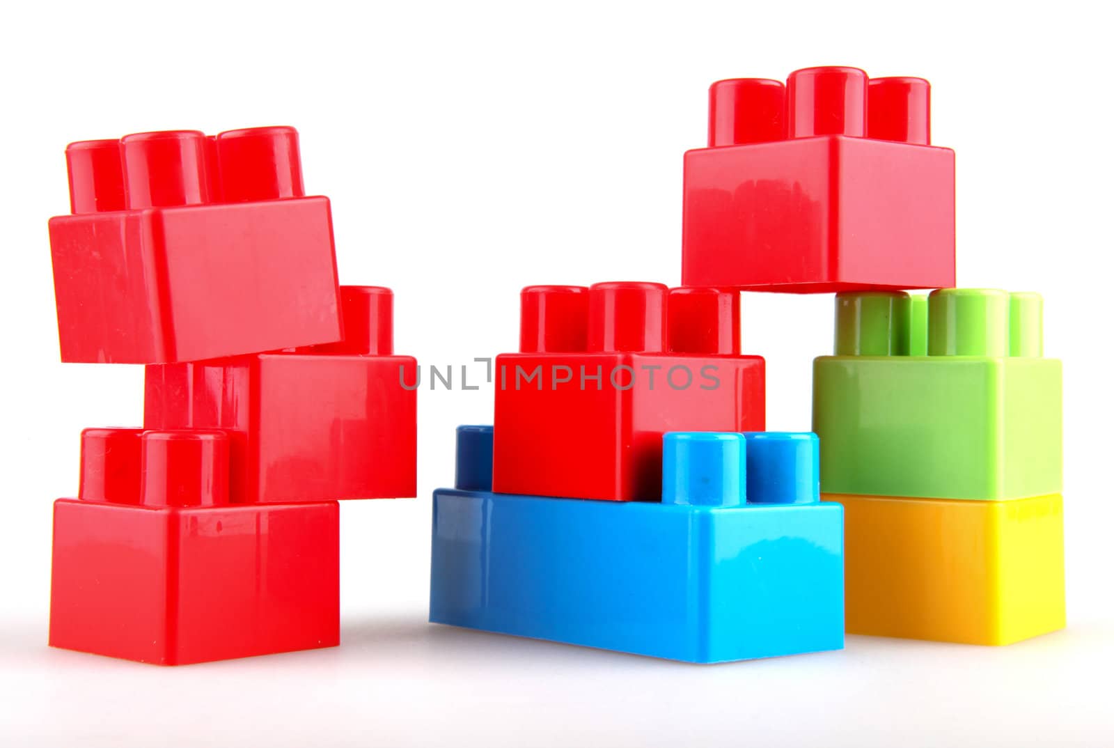Plastic building blocks on a white background