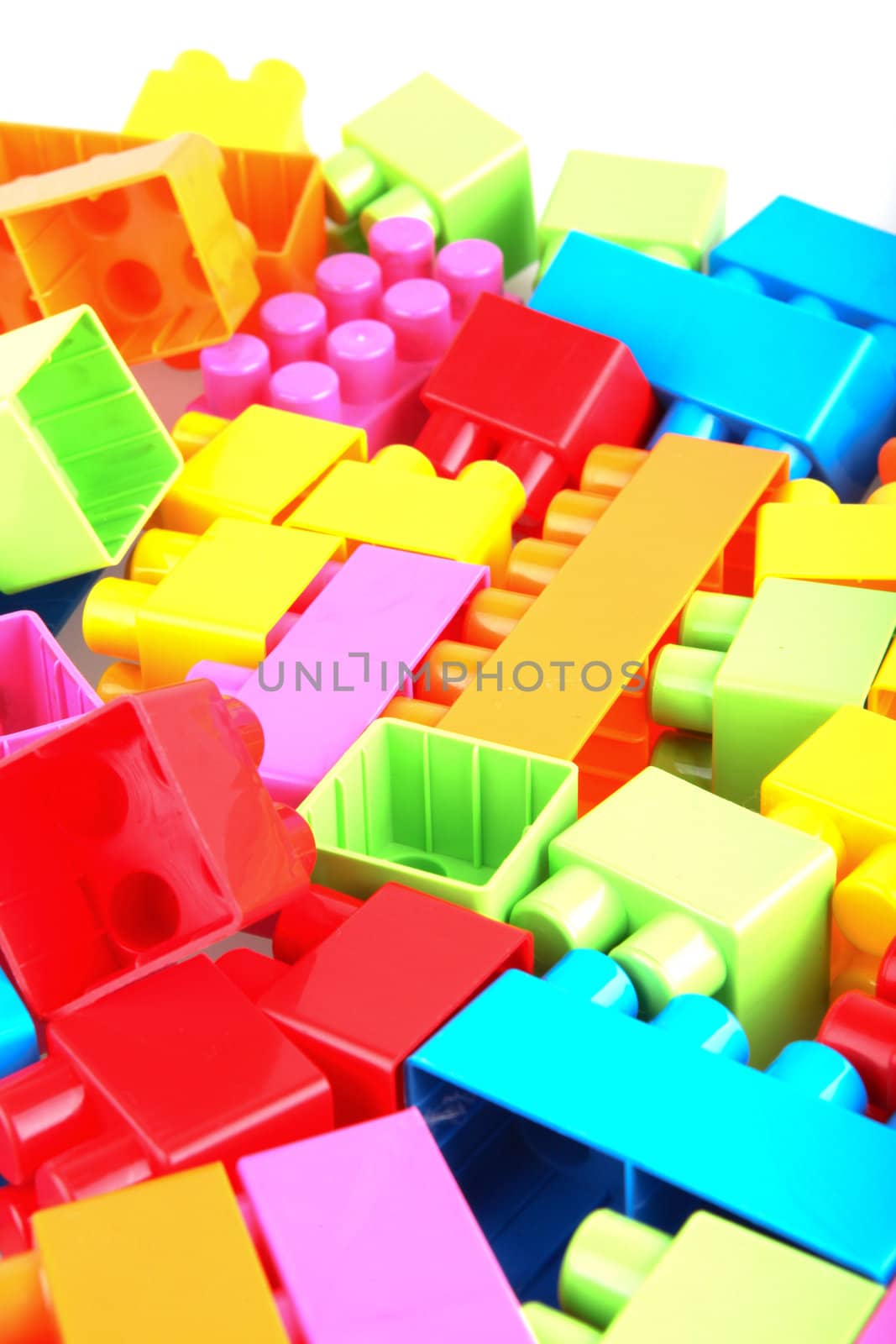 Plastic building blocks on a white background