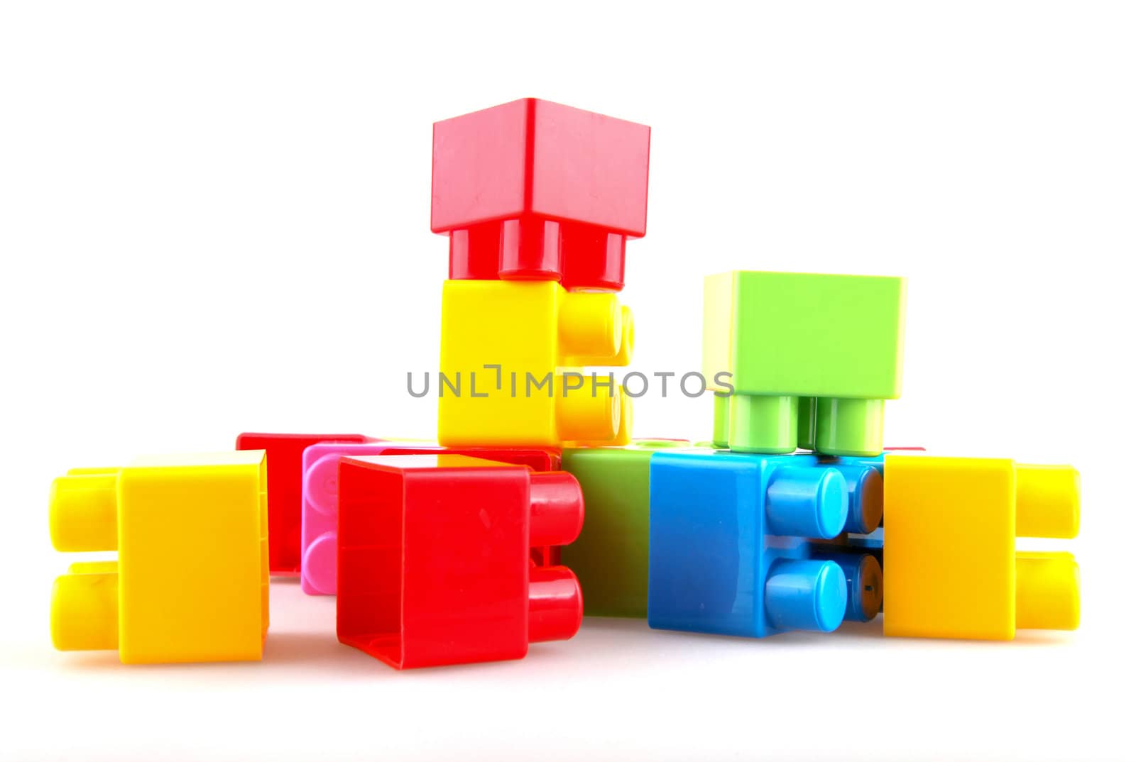 Plastic building blocks on a white background