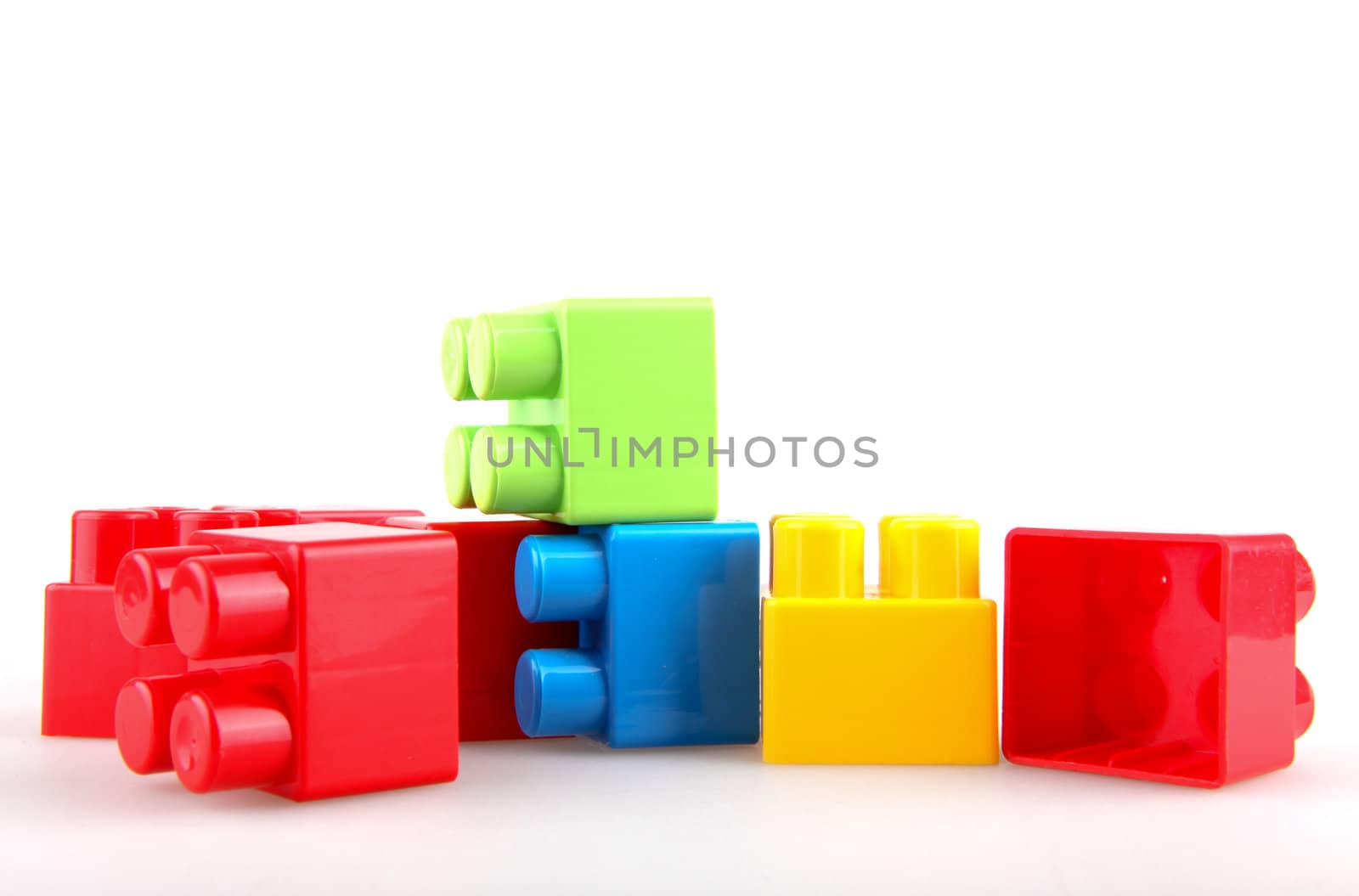 Plastic building blocks on a white background