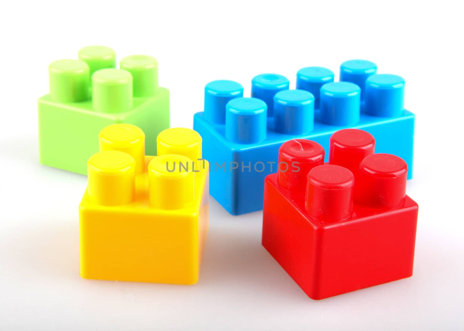 Plastic building blocks on a white background