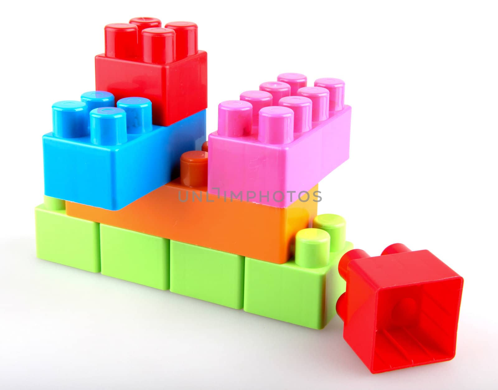 Plastic building blocks on a white background