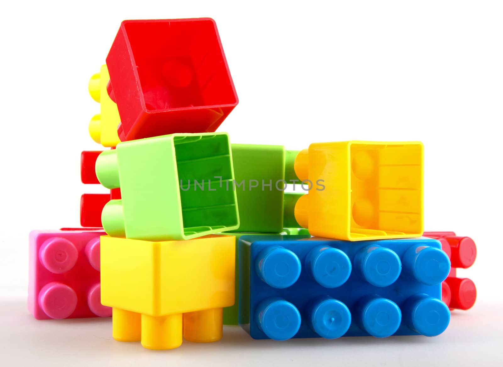 Plastic building blocks on a white background