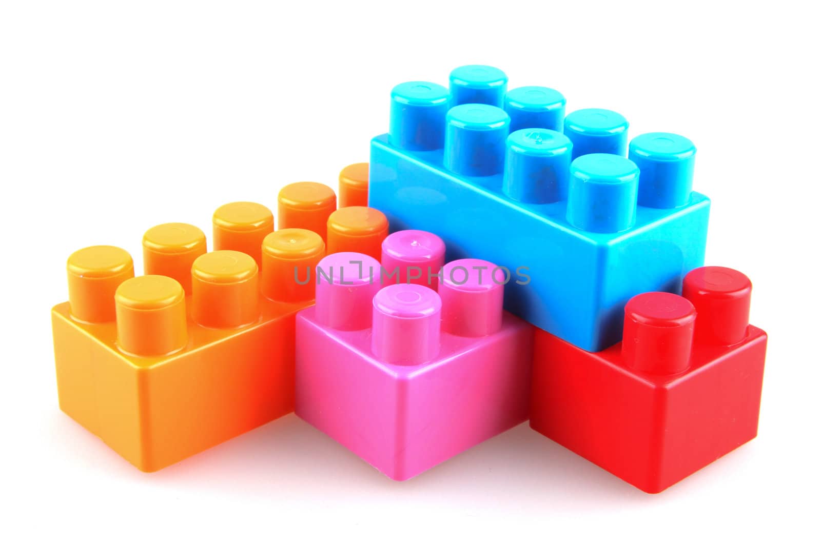 Plastic building blocks on a white background