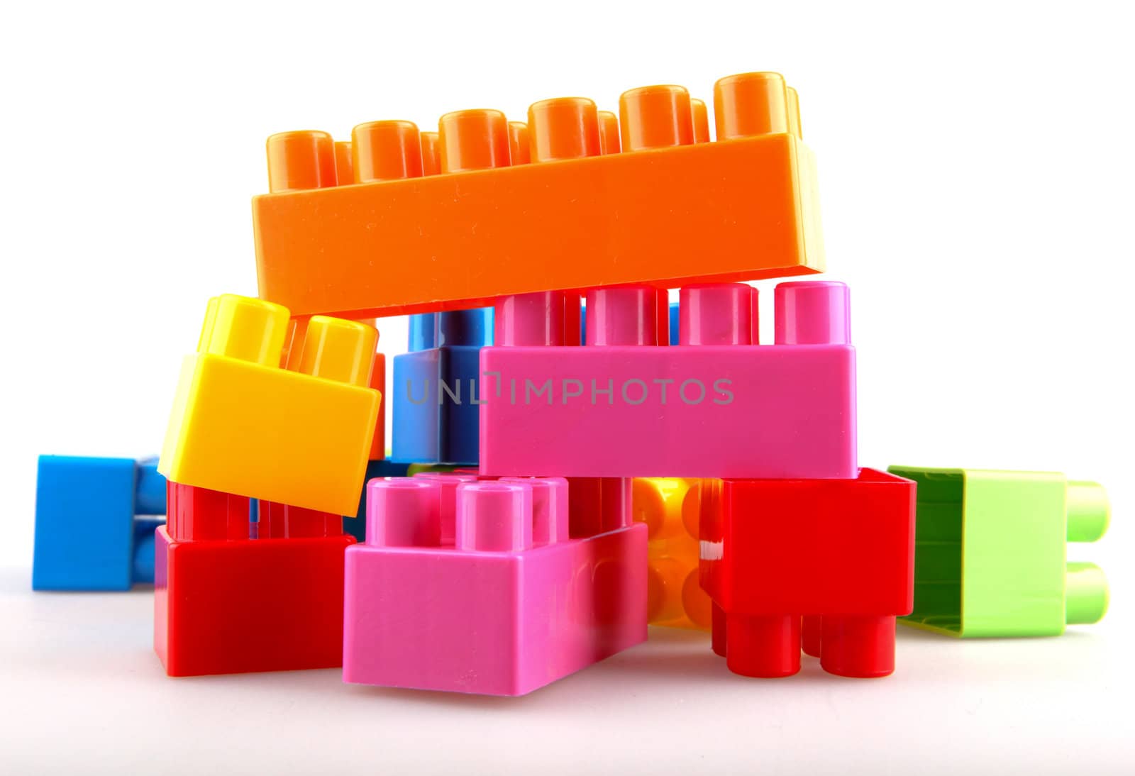 Plastic building blocks on a white background
