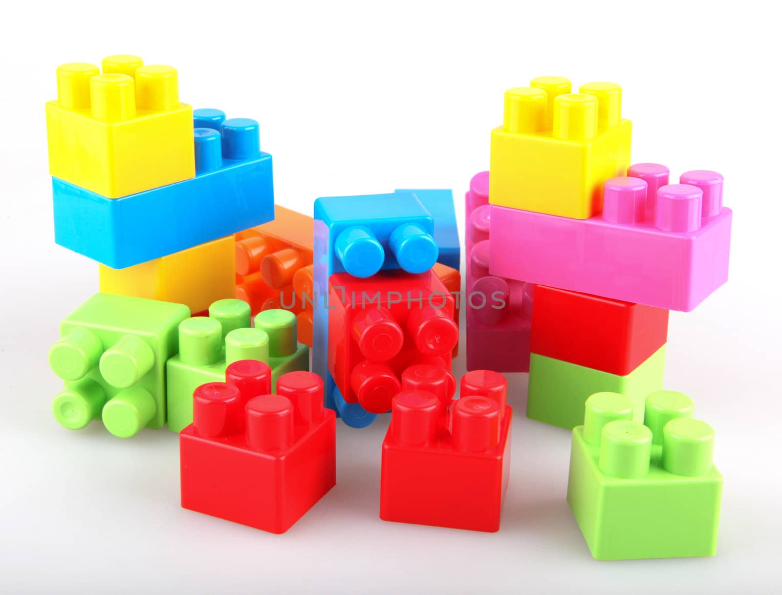 Plastic building blocks on a white background