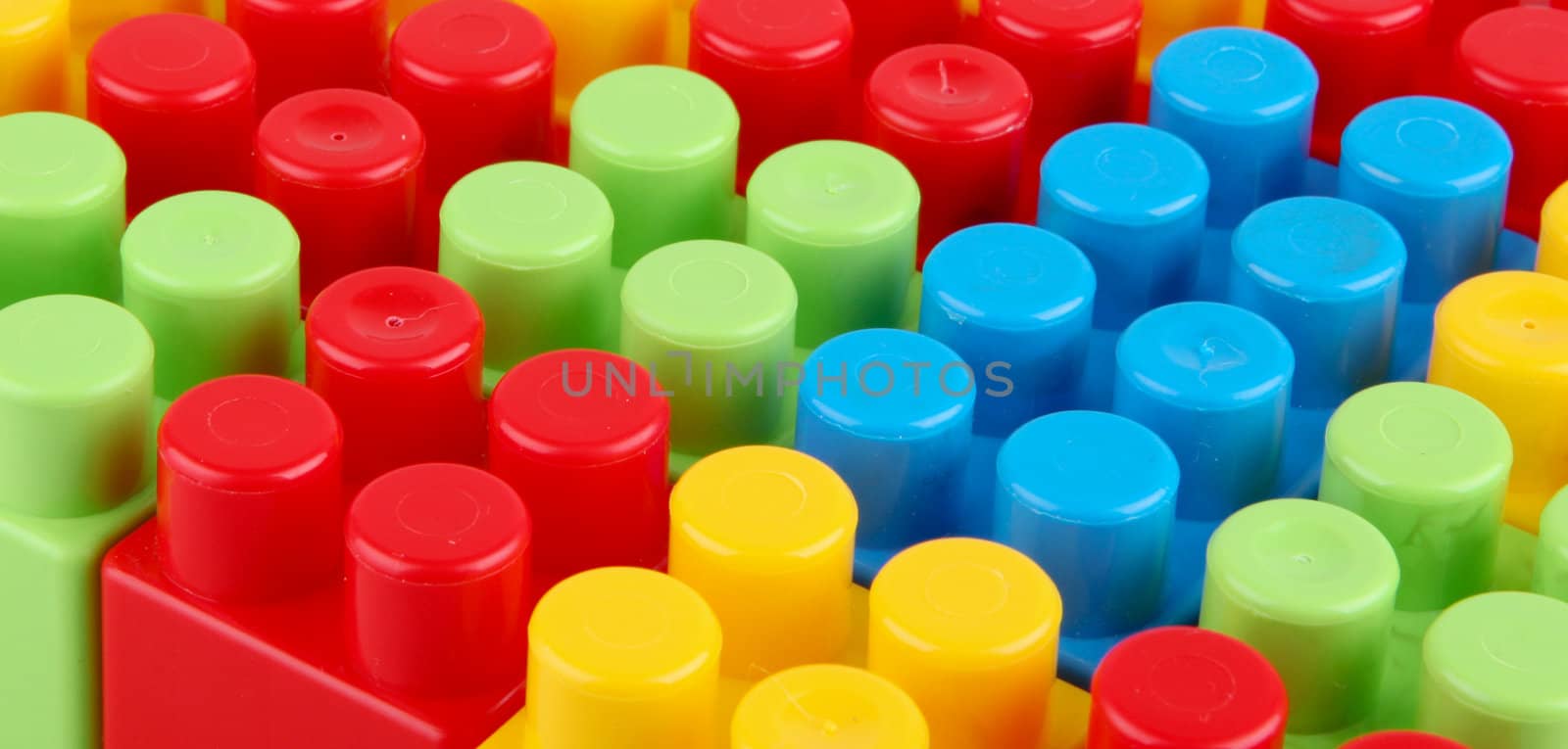 Plastic building blocks on a white background