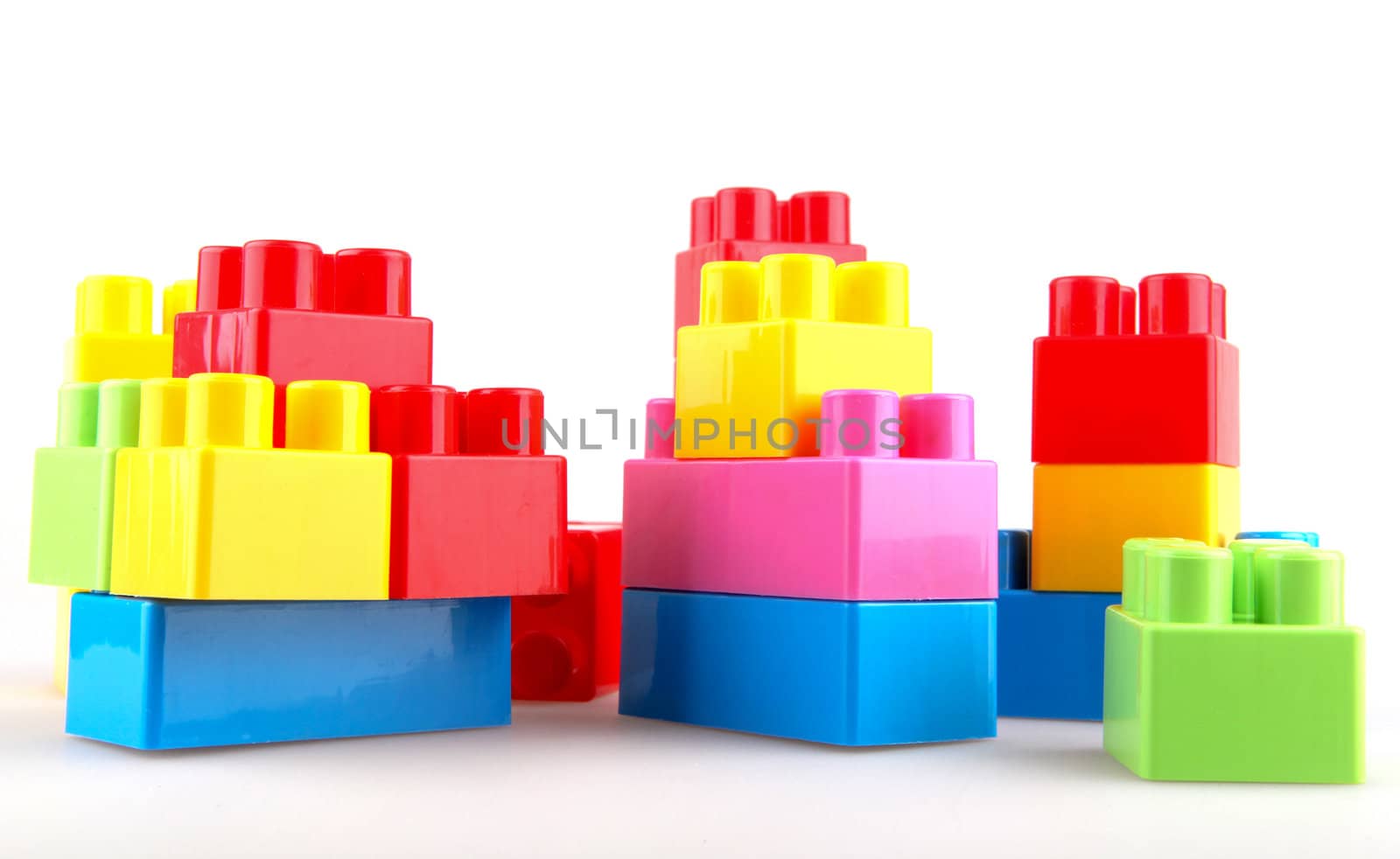 Plastic building blocks on a white background