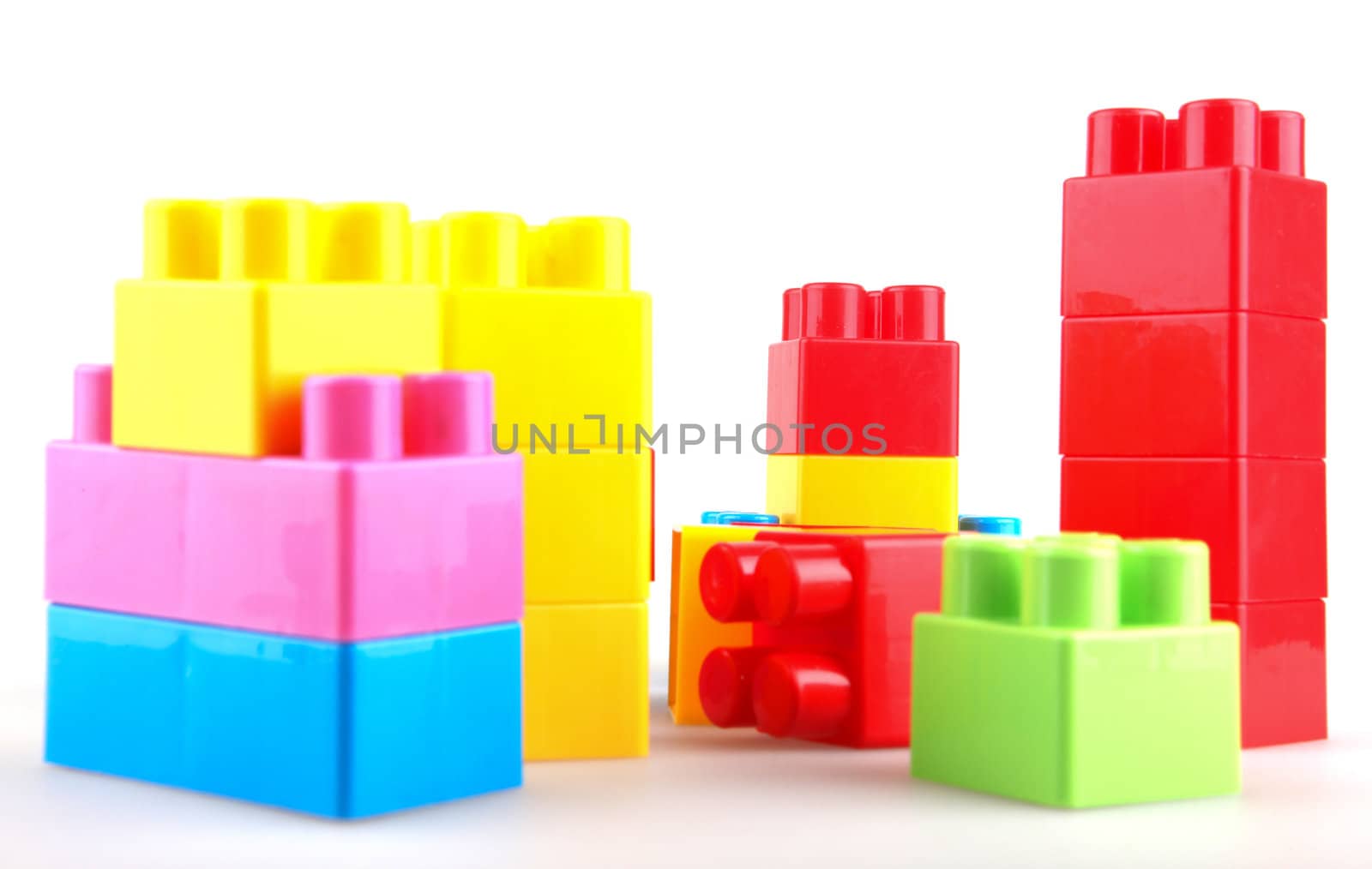 Plastic building blocks on a white background