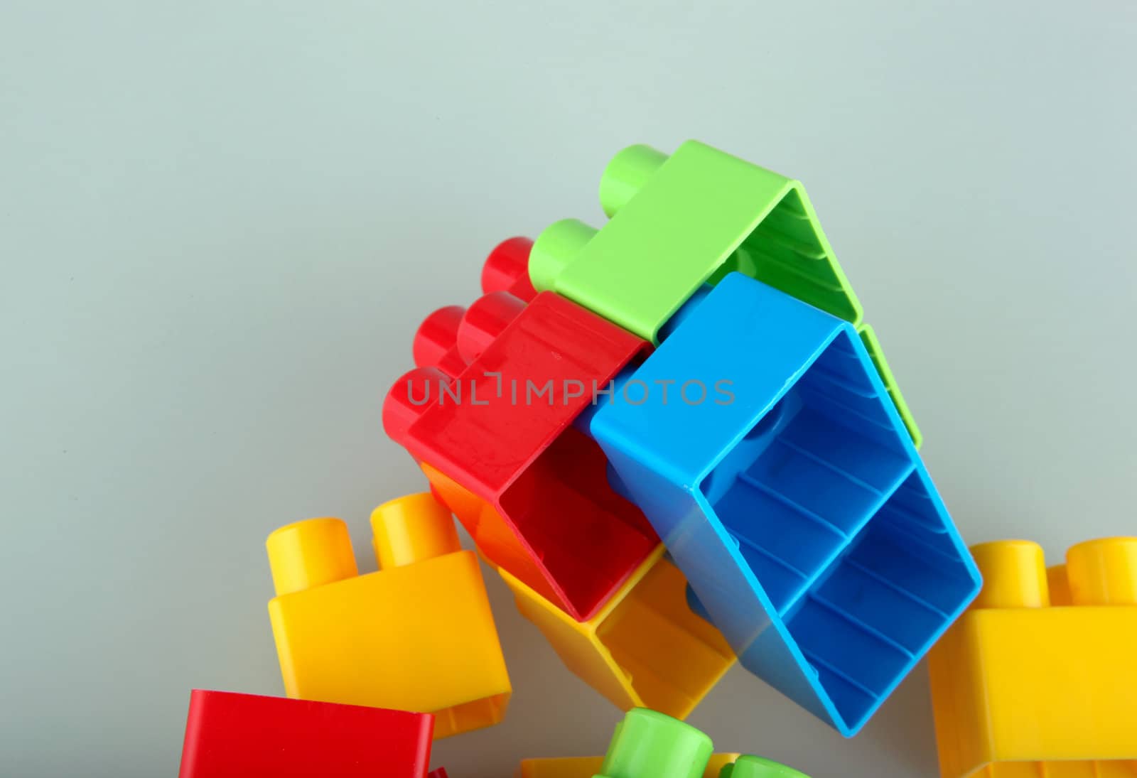 Plastic building blocks on a white background