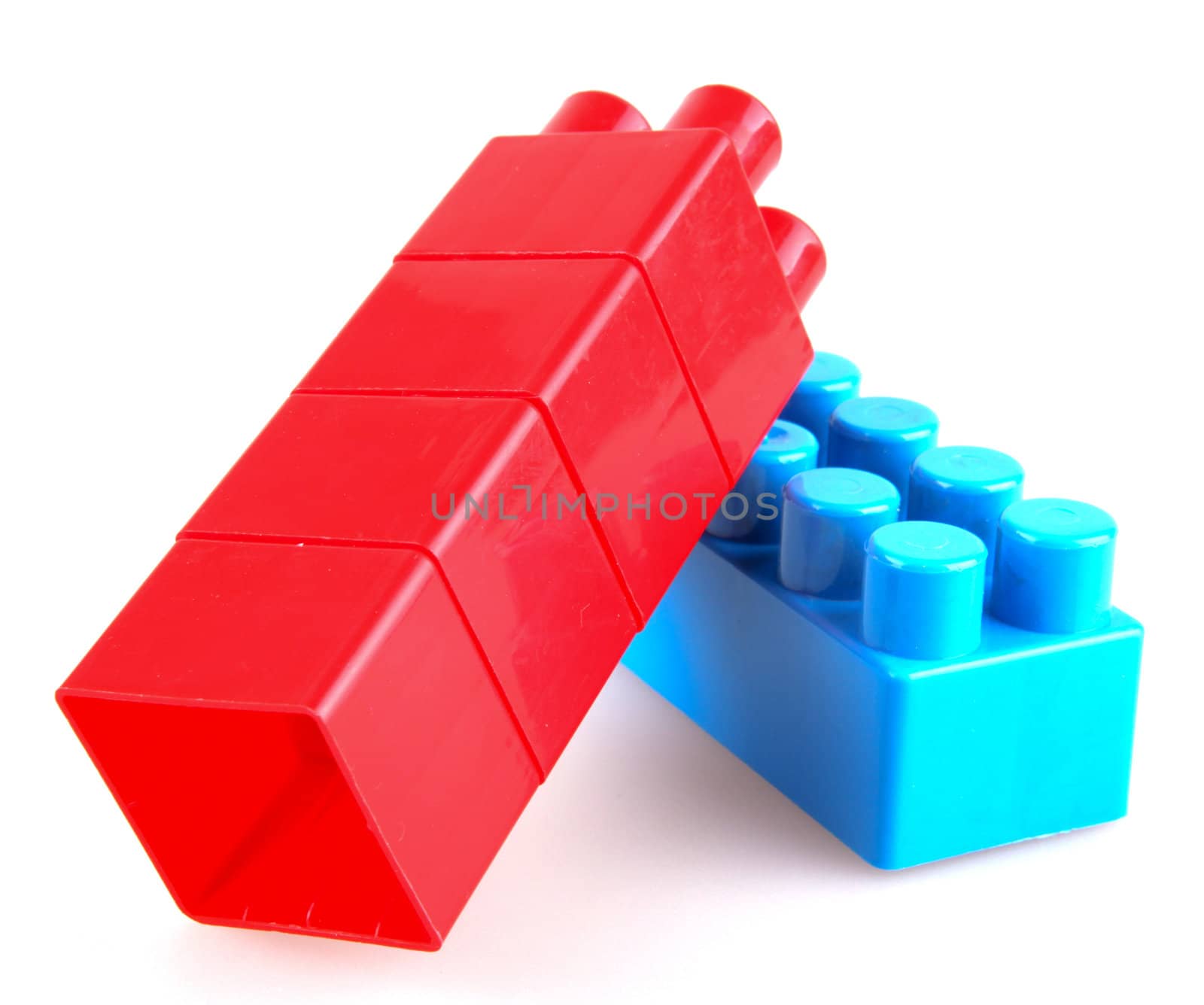 Plastic building blocks on a white background