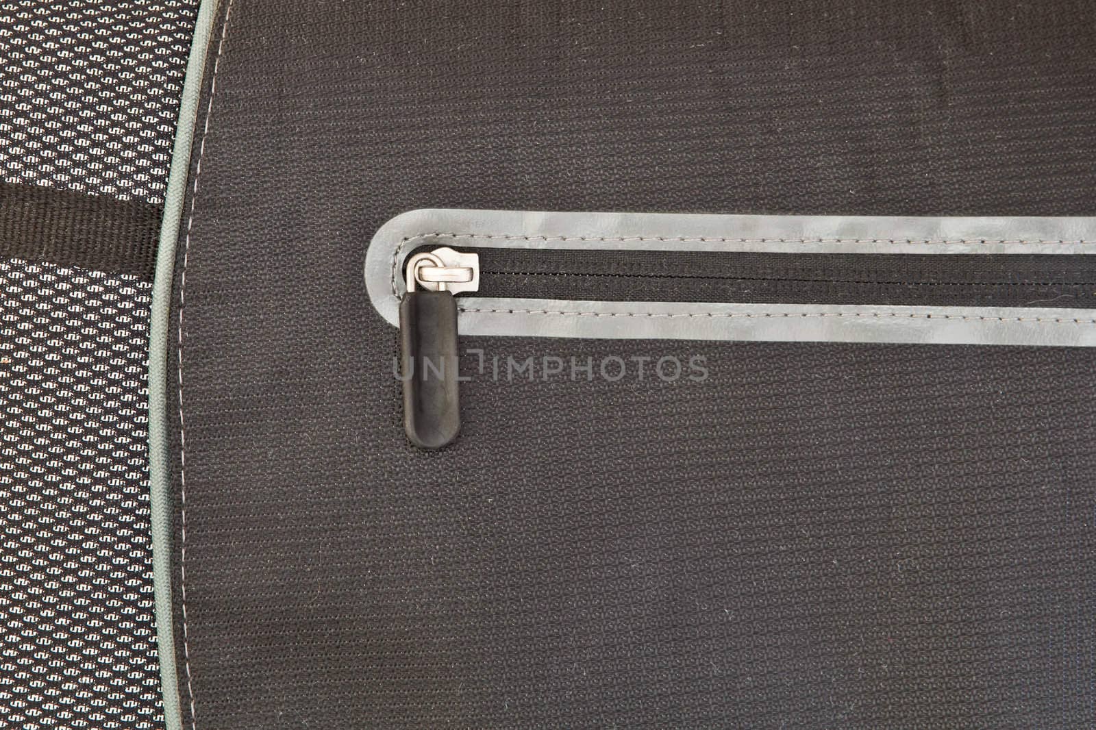 Closed zip on a modern nylon laptop bag