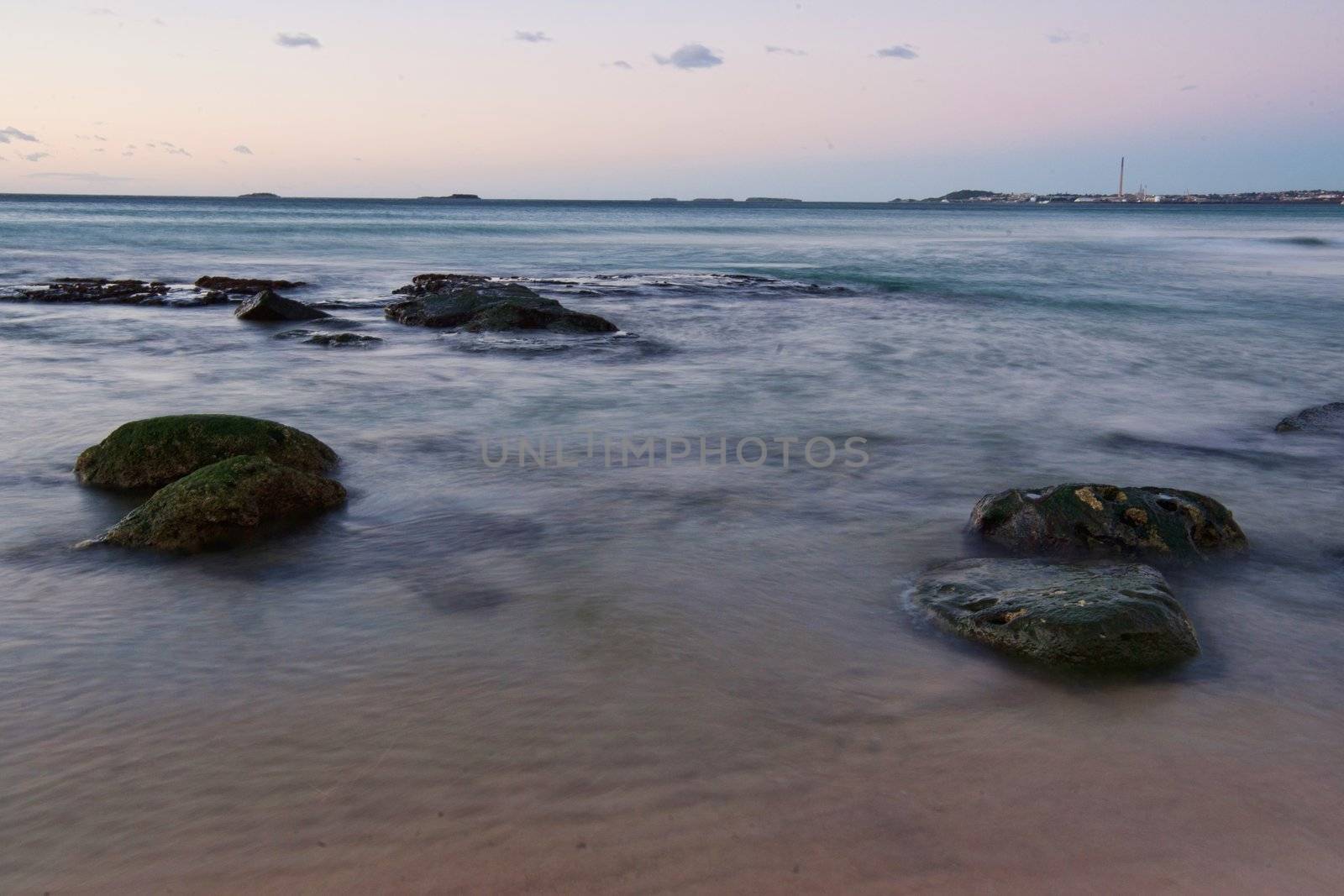 peaceful beach sunrise by clearviewstock