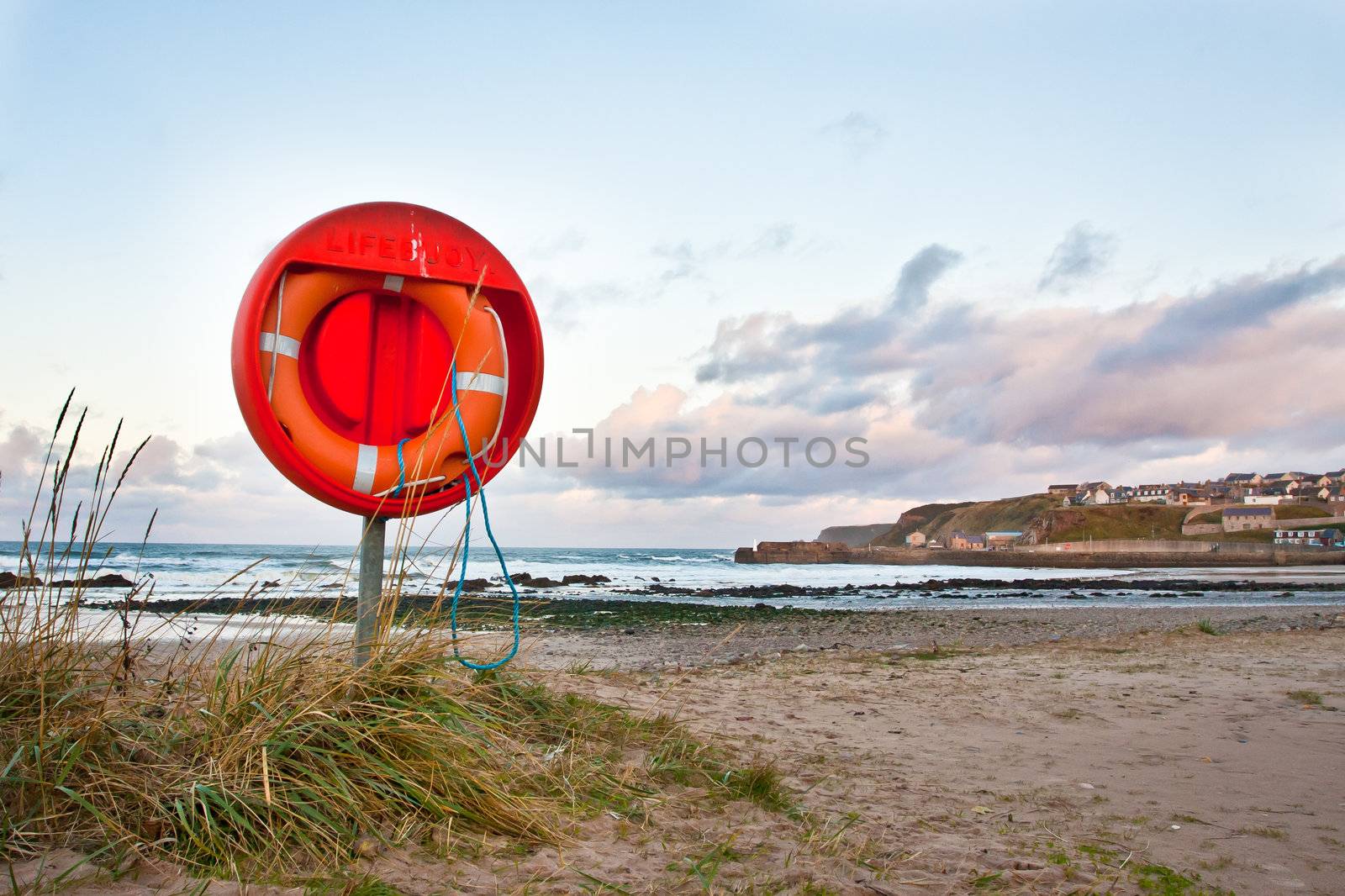 An emergency floatation device at a beach in Scotland