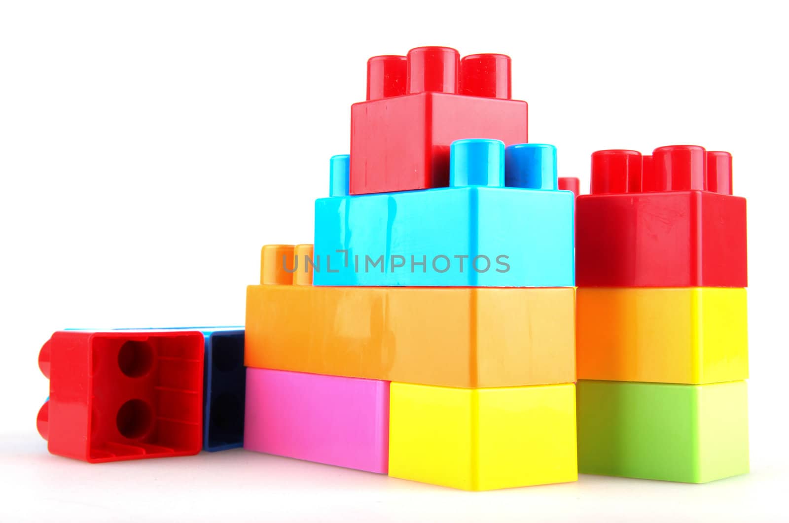 Plastic building blocks on a white background