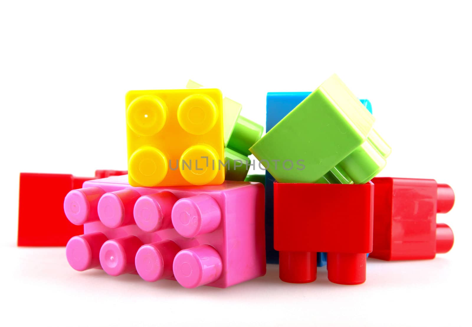 Plastic building blocks on a white background