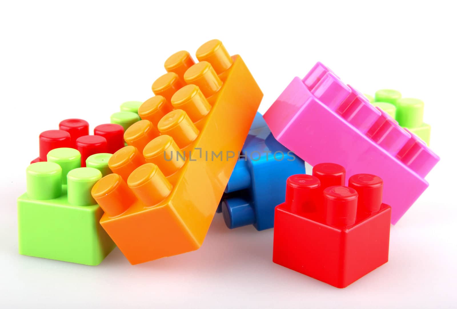 Plastic building blocks on a white background