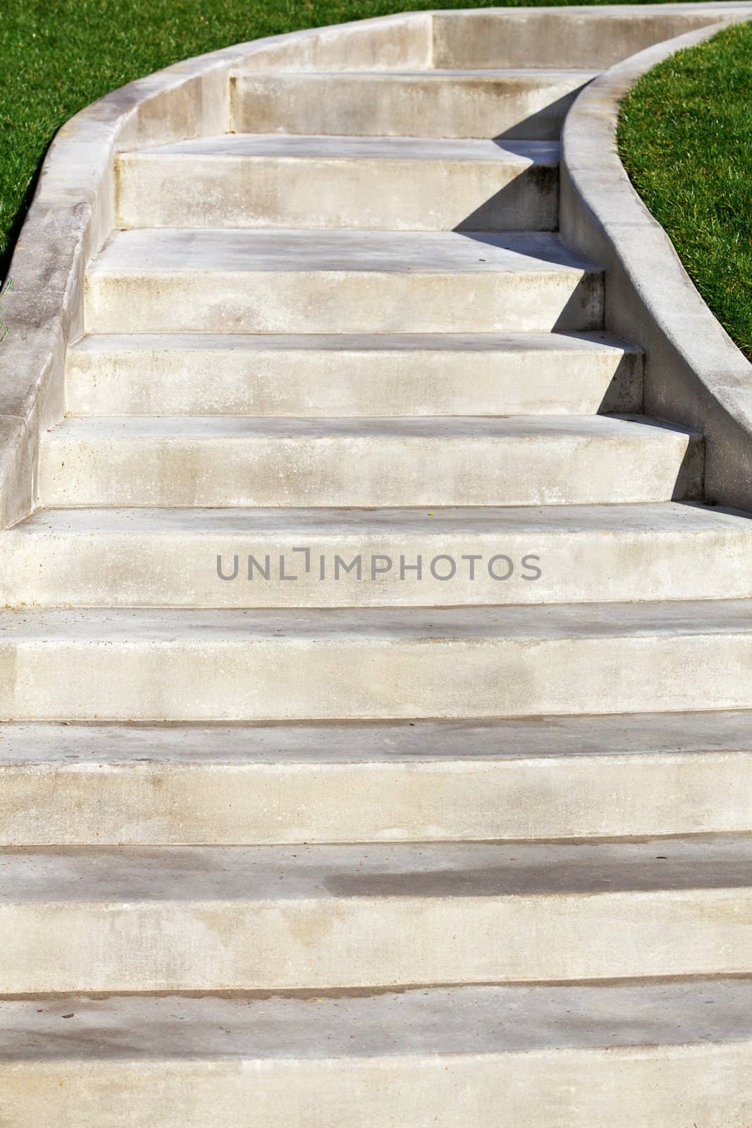 New Ascending Concrete Staircase with green grass on edges