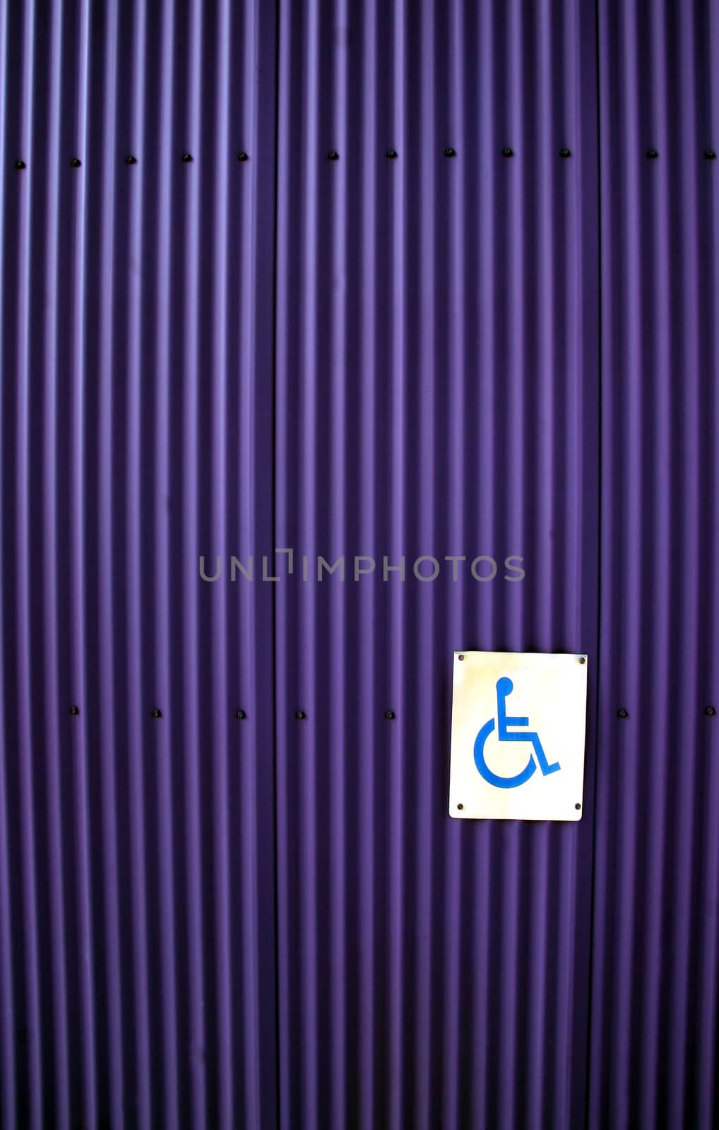 Disabled sign on a door