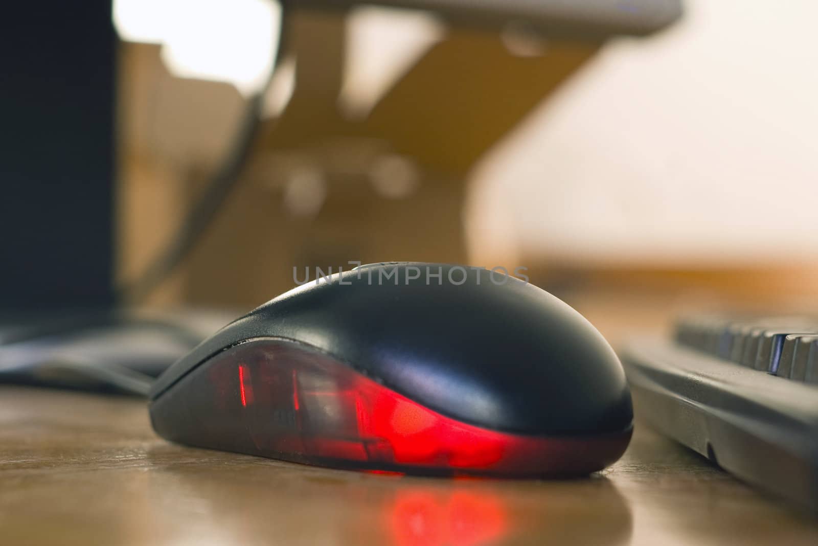 Infrared black mouse on desk with blurred background