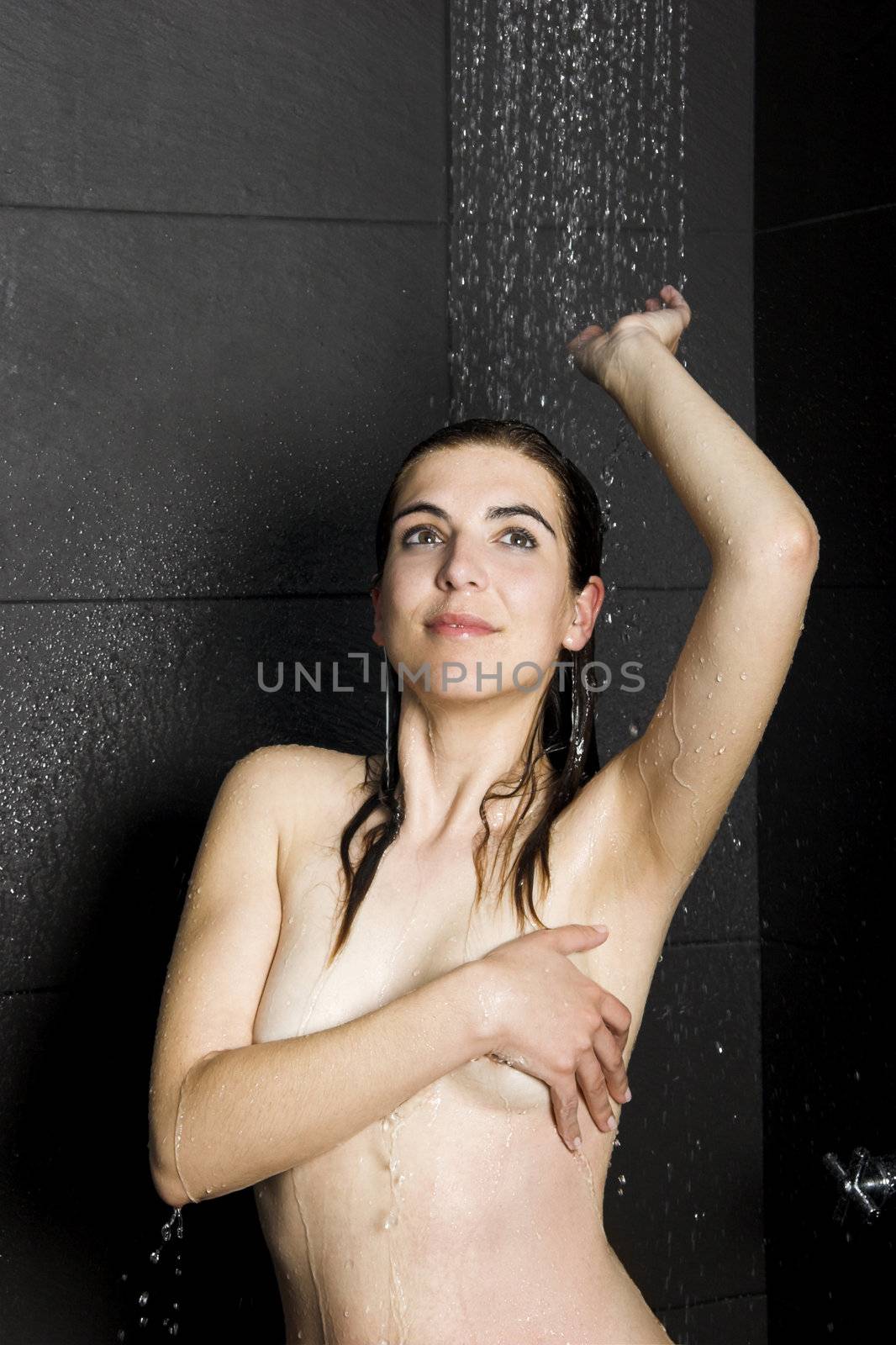 Beautiful woman relaxing and taking a bath 