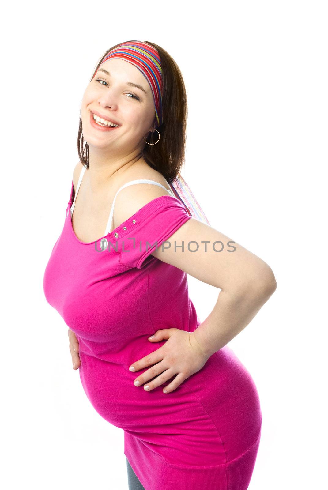 portrait of a beautiful happy laughing pregnant woman against white background