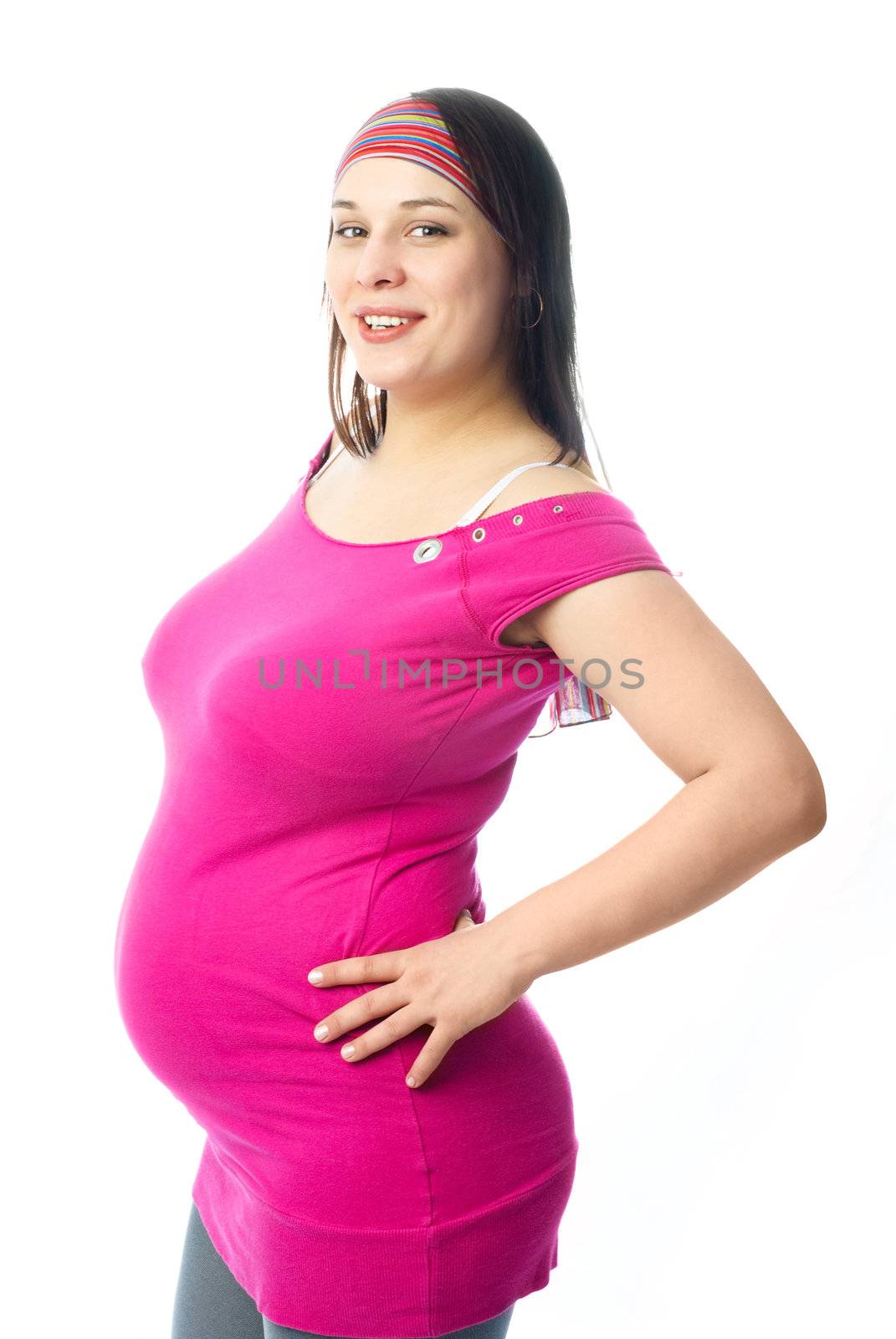 portrait of a beautiful happy pregnant woman against white background
