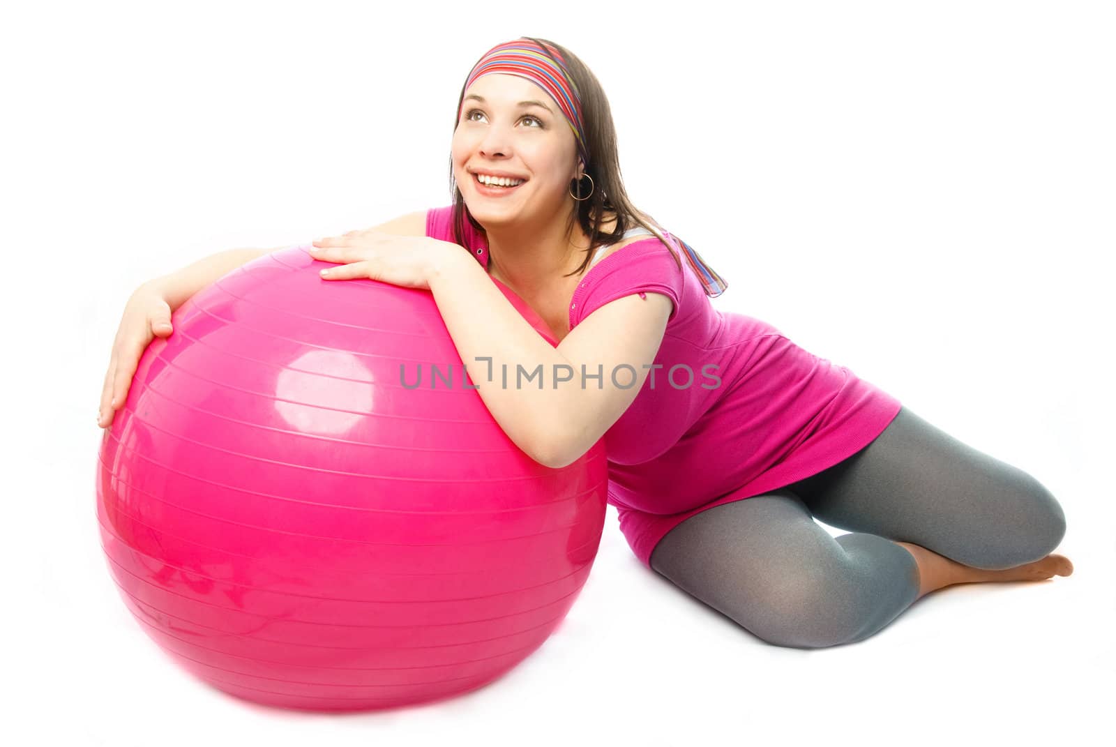 happy pregnant woman with a fitness ball by lanak