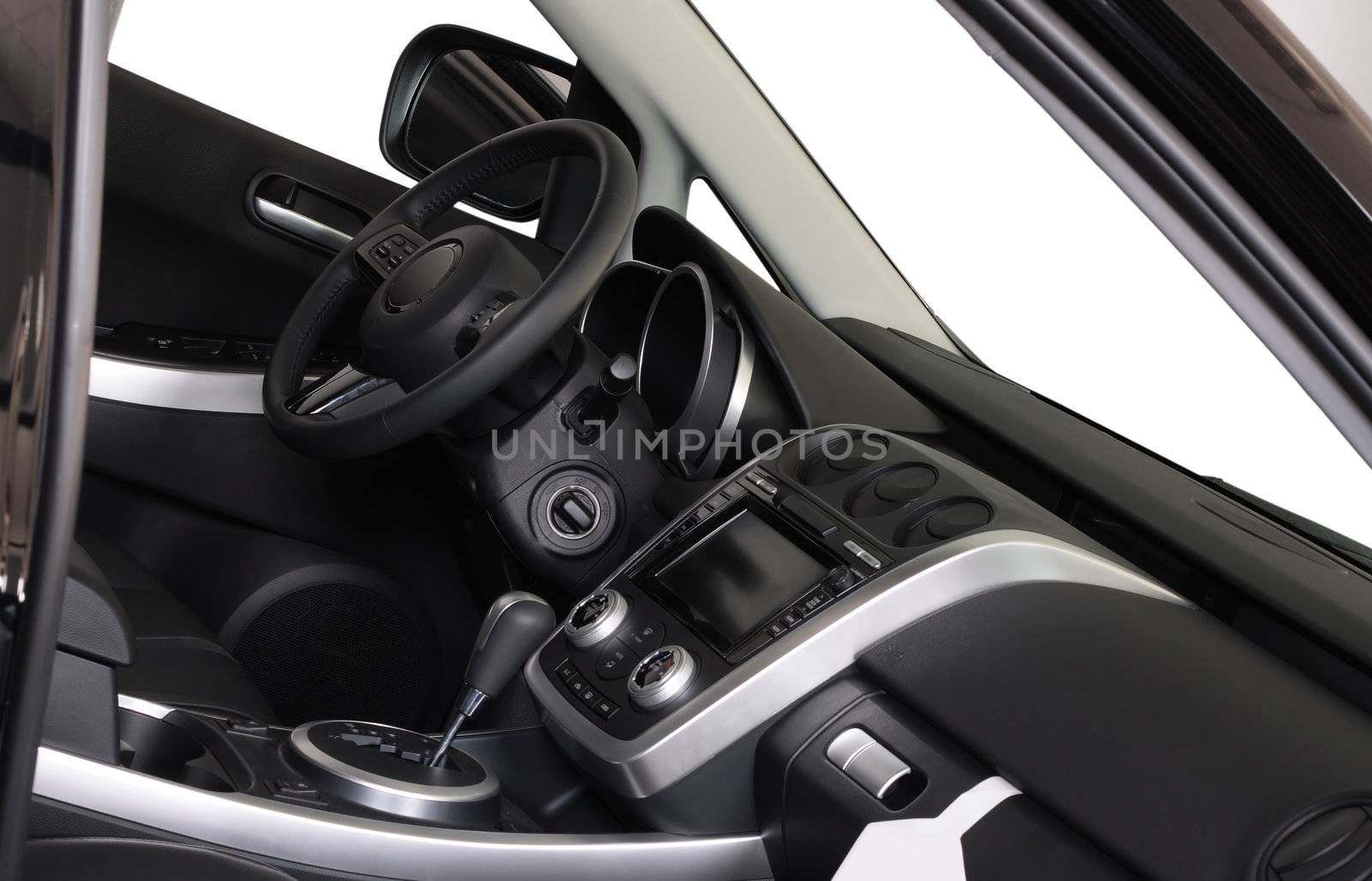 Car interior - dashboard and steering wheel by Gdolgikh