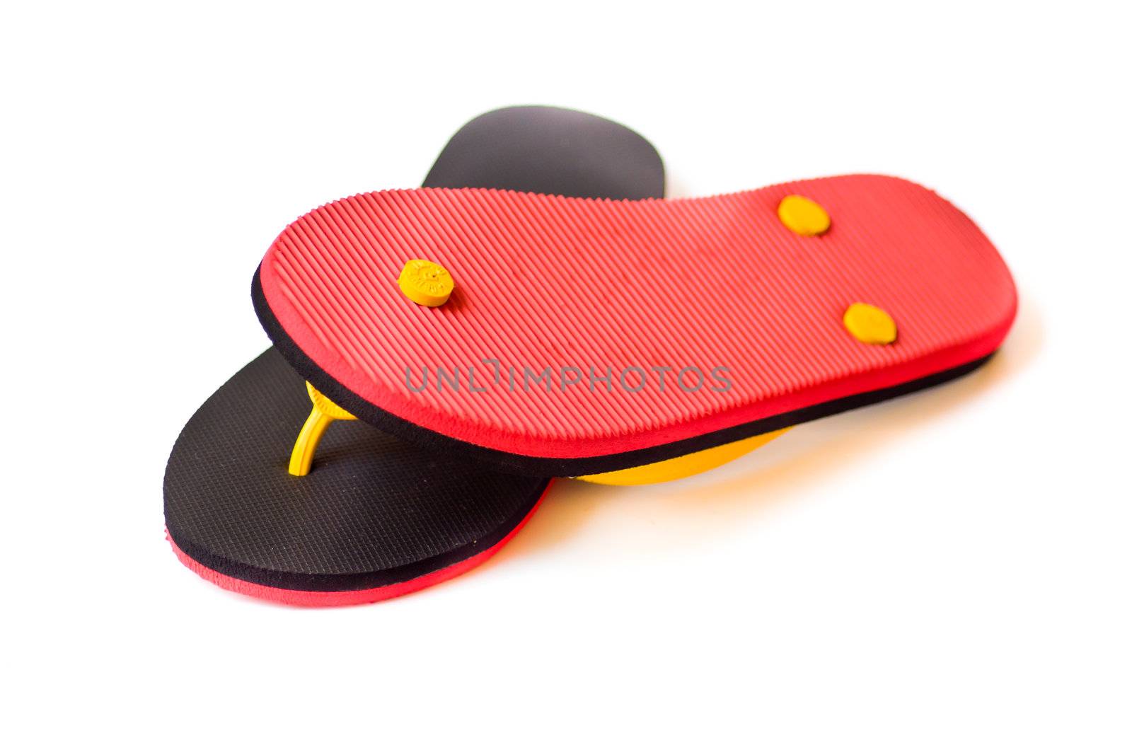 black and red slipper on white background