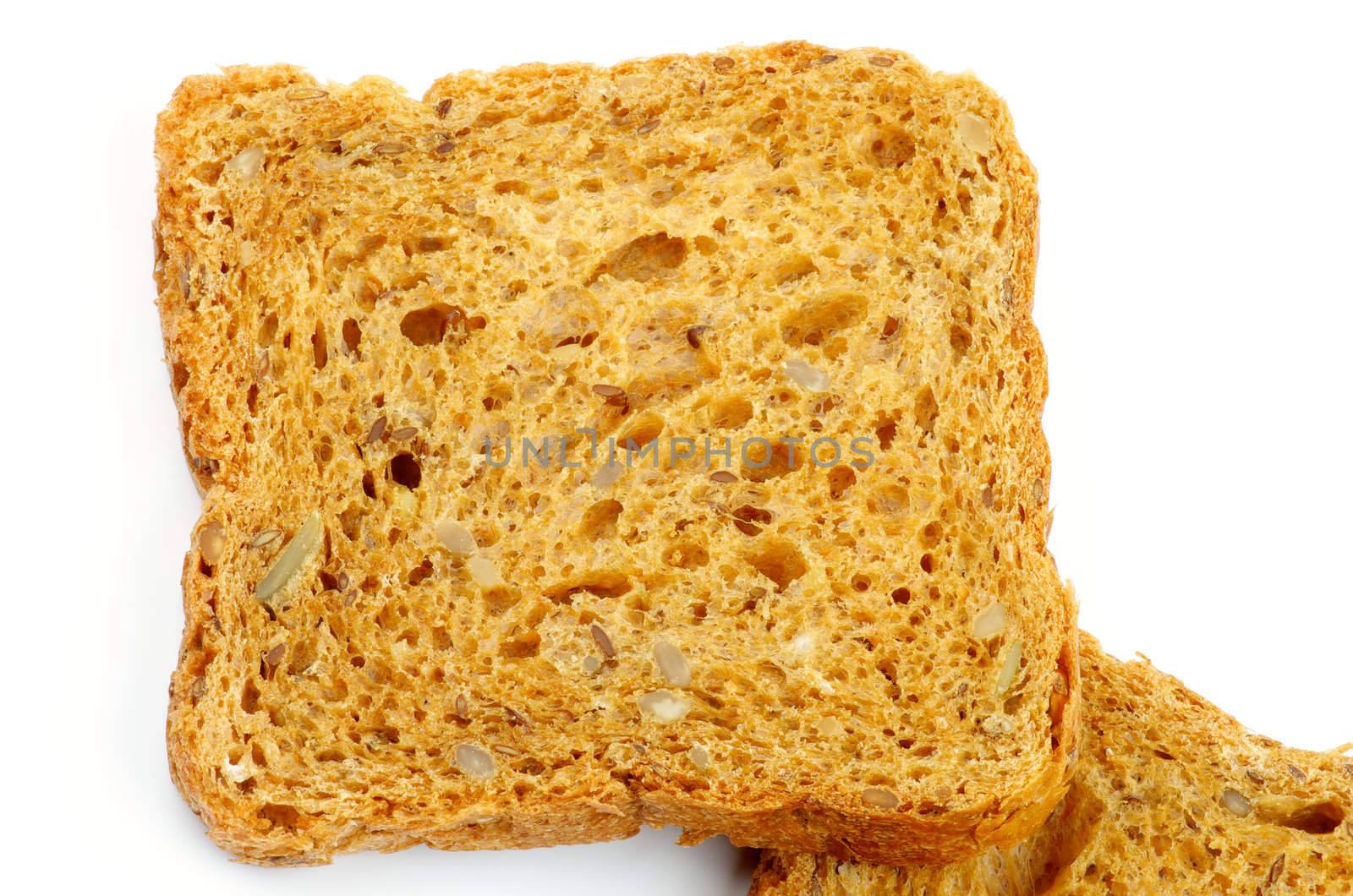 Square Slice of Brown Whole Wheat Bread with Seeds and Nuts closeup on white background