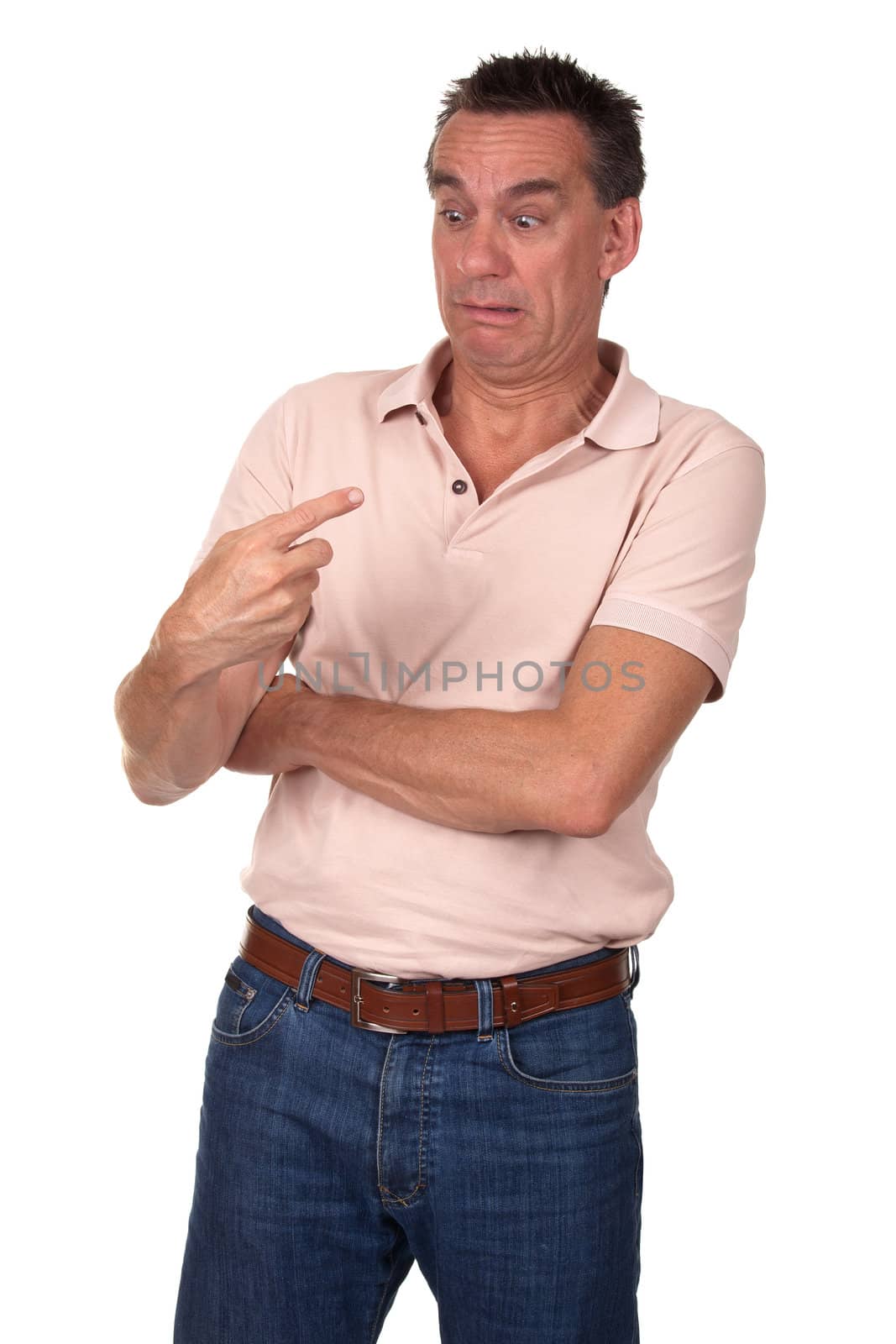 Attractive Middle Age Man Stares in Horror at Something on the End of His Finger Isolated