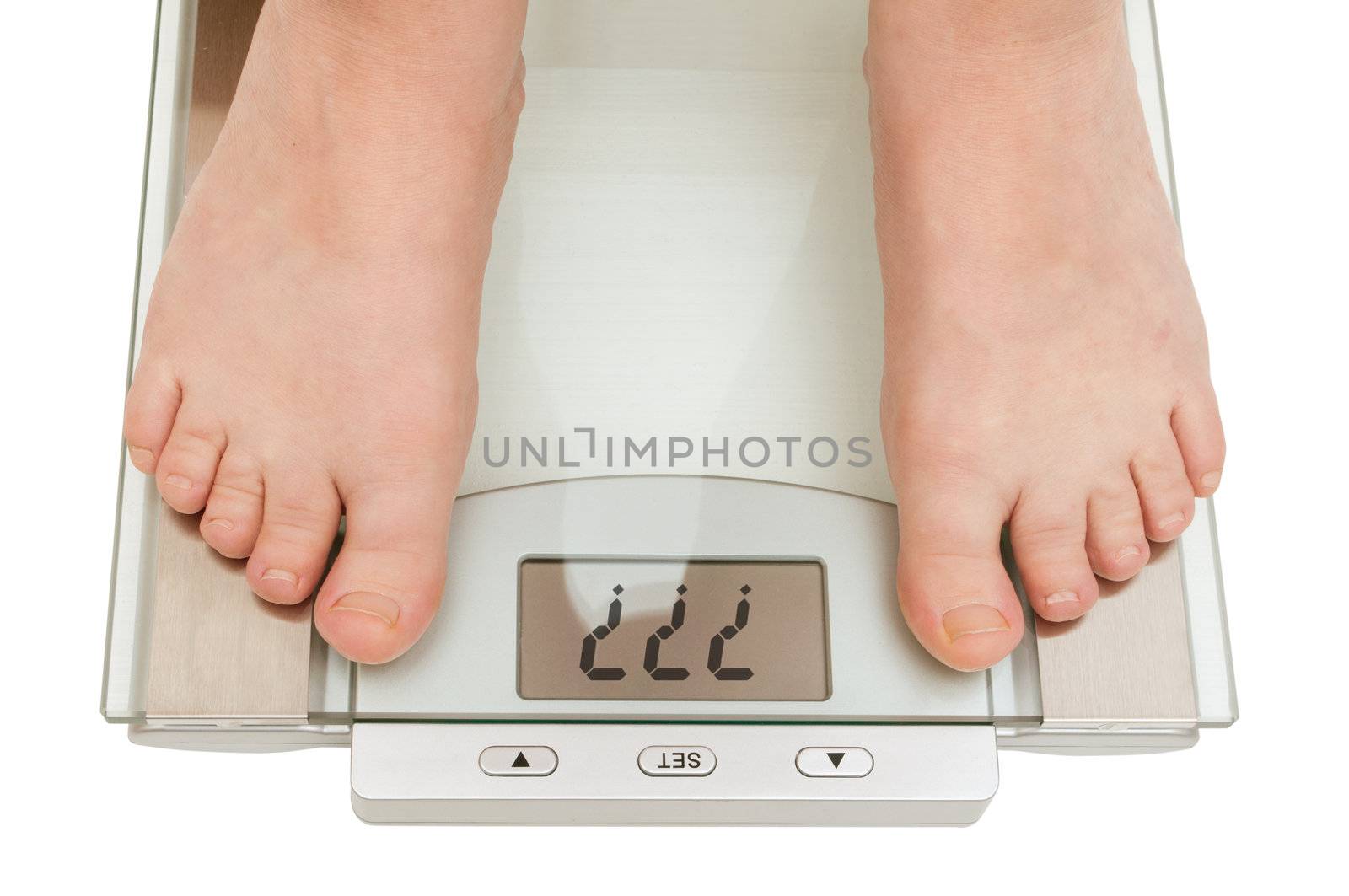 Female feet on scales isolated on white - Question Marks on Display