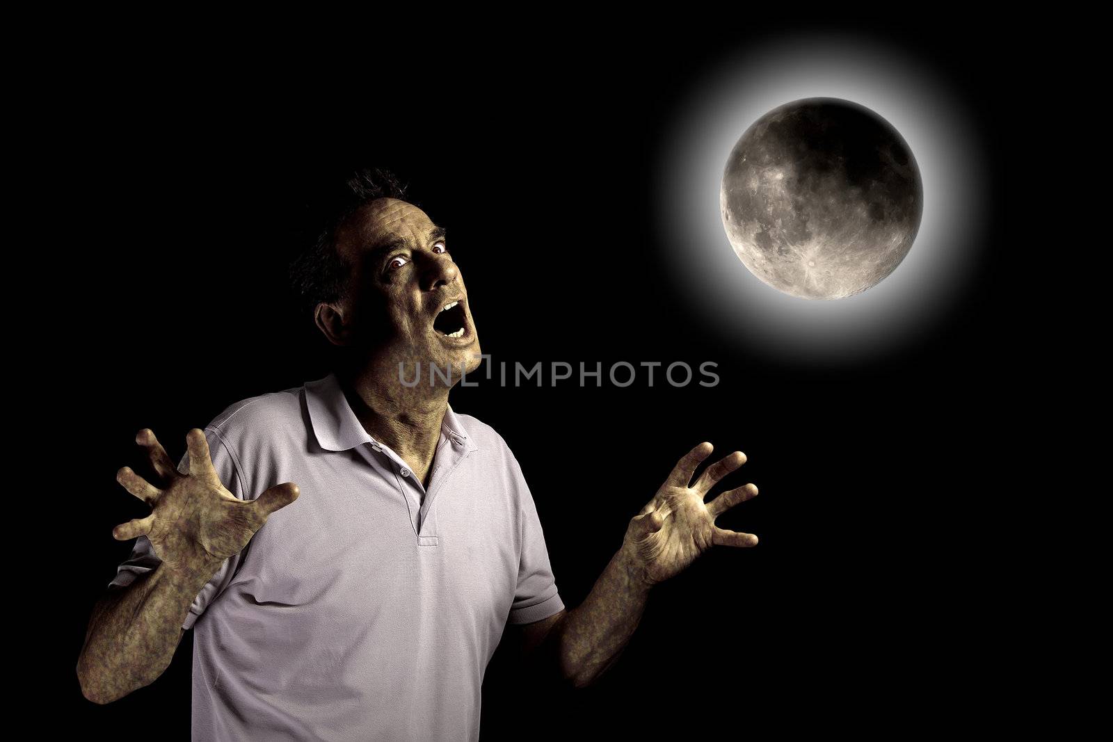 Scary Man Turning into Werewolf or Beast Under a Cloudy Full Moon