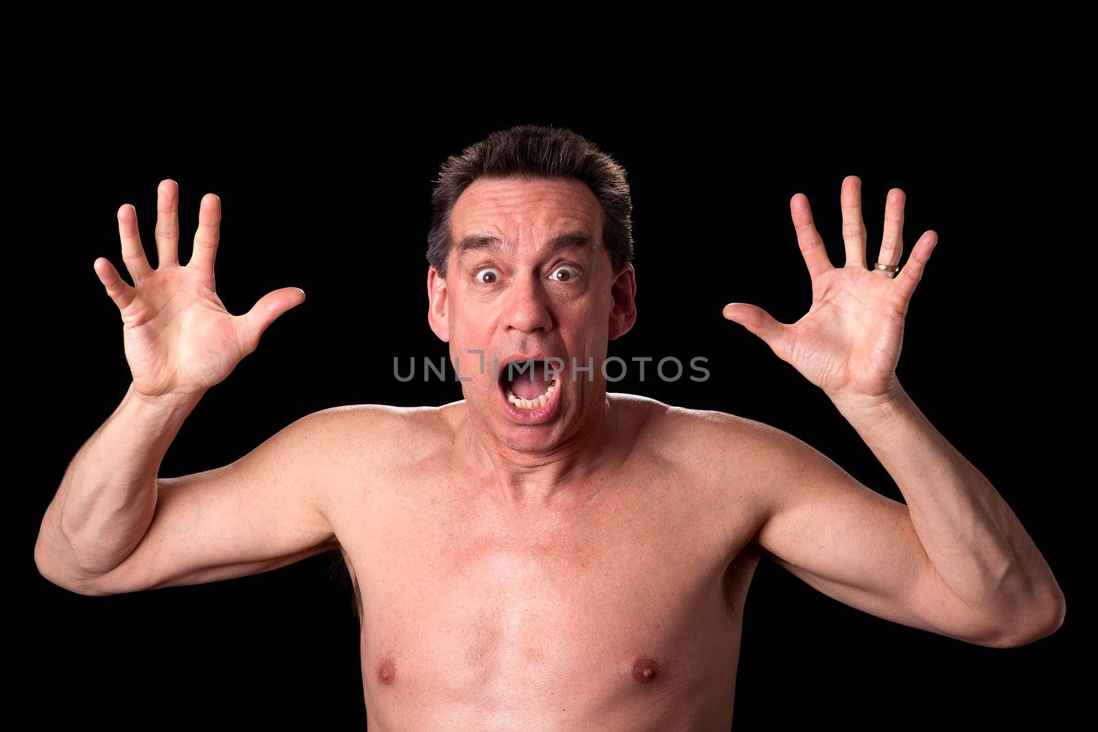 Middle Age Shirtless Man Screaming Shouting in Horror on Black Background