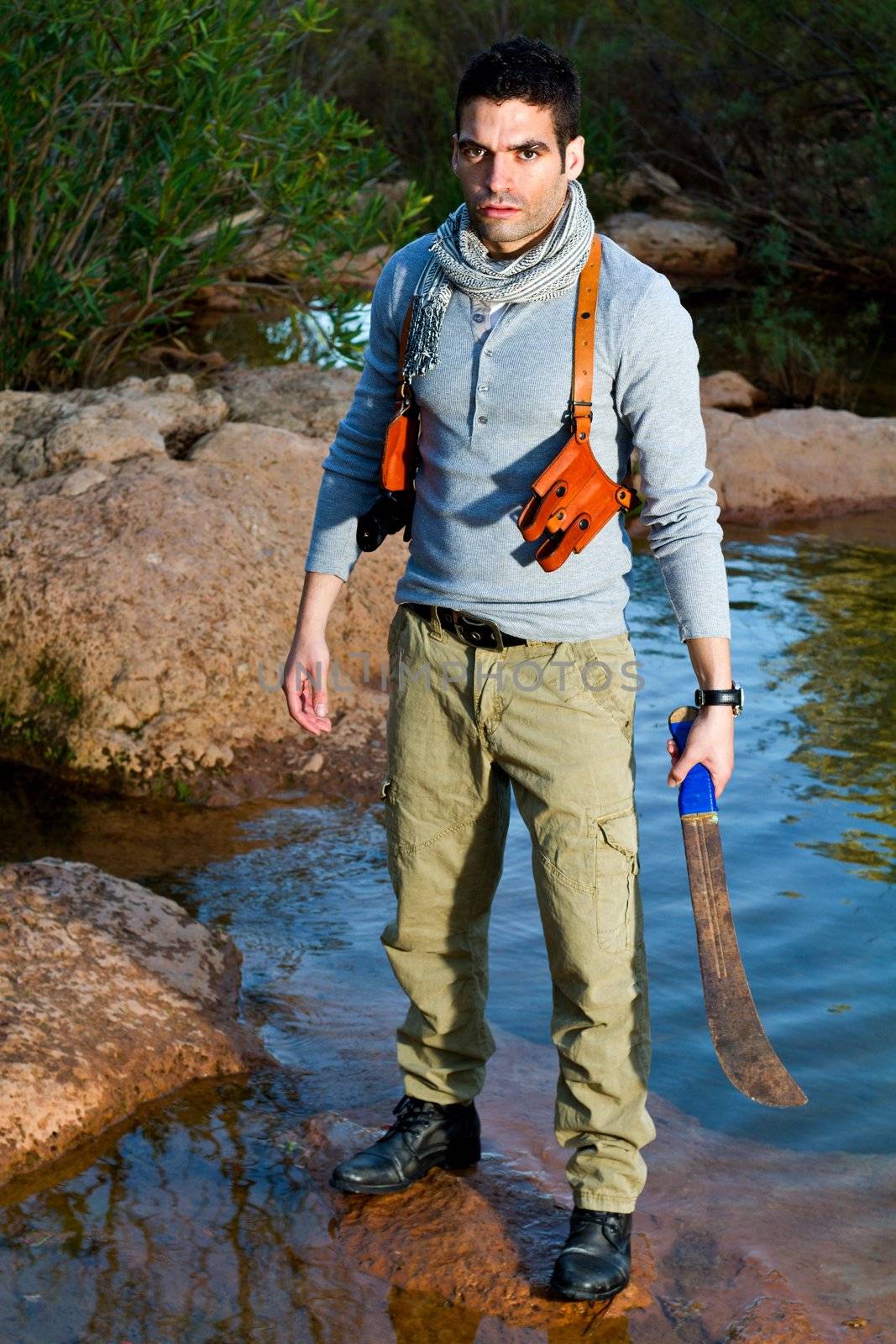 View of an treasure hunter, jungle adventurer type man.