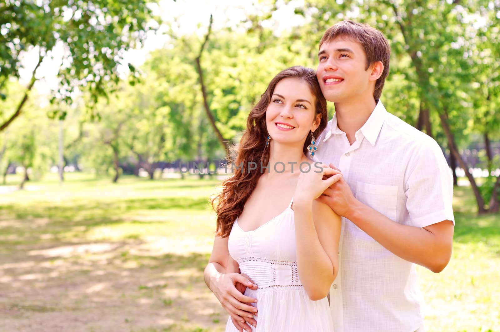 couple hugging in the park, have a good time together