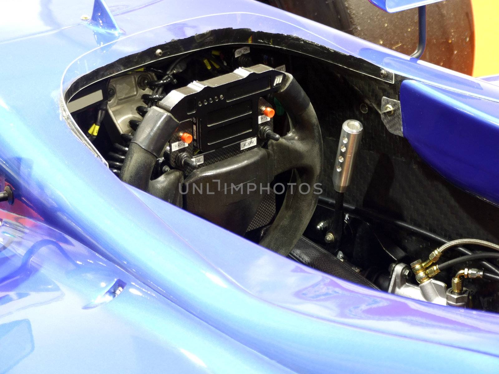 racing car dashboard and steering wheel