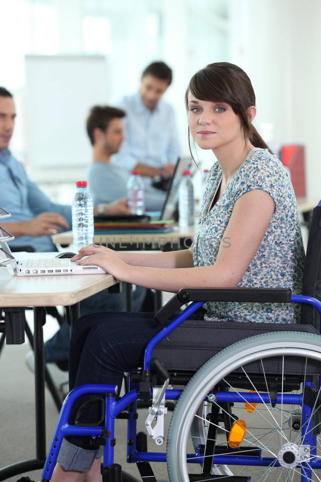 Young woman disabled at work by phovoir