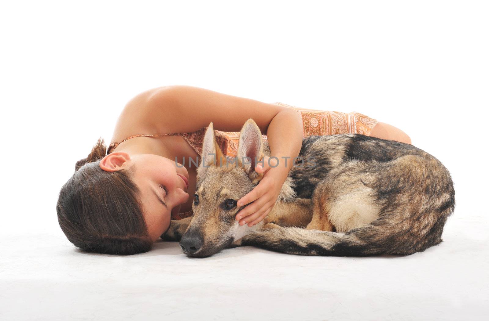 young girl and her puppy slovakia wolf sleeping together