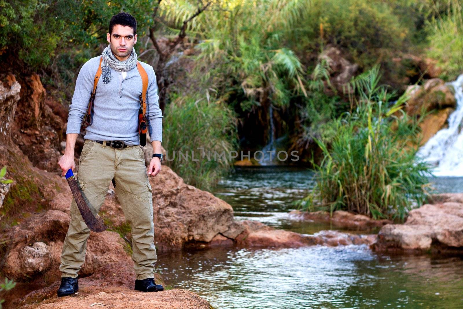 View of an treasure hunter, jungle adventurer type man.