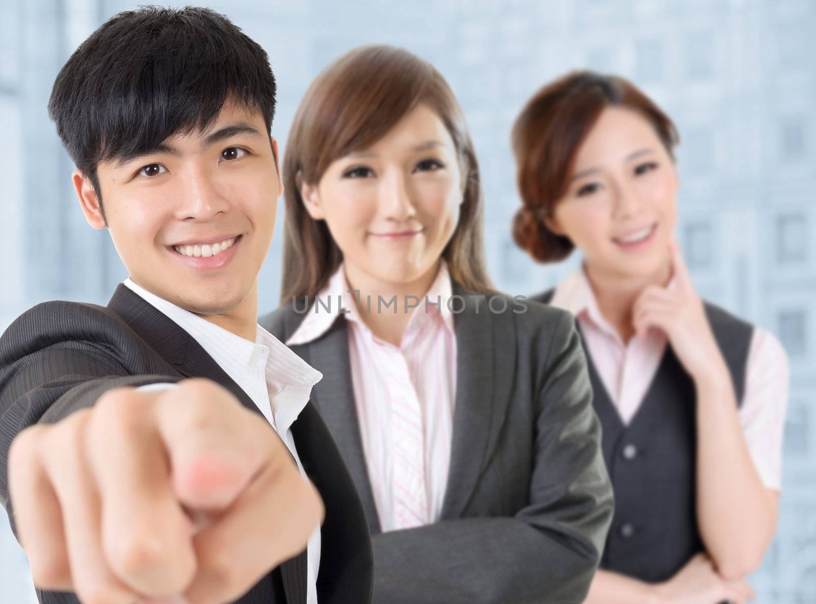 Businessman give you a gesture of want you with his team.