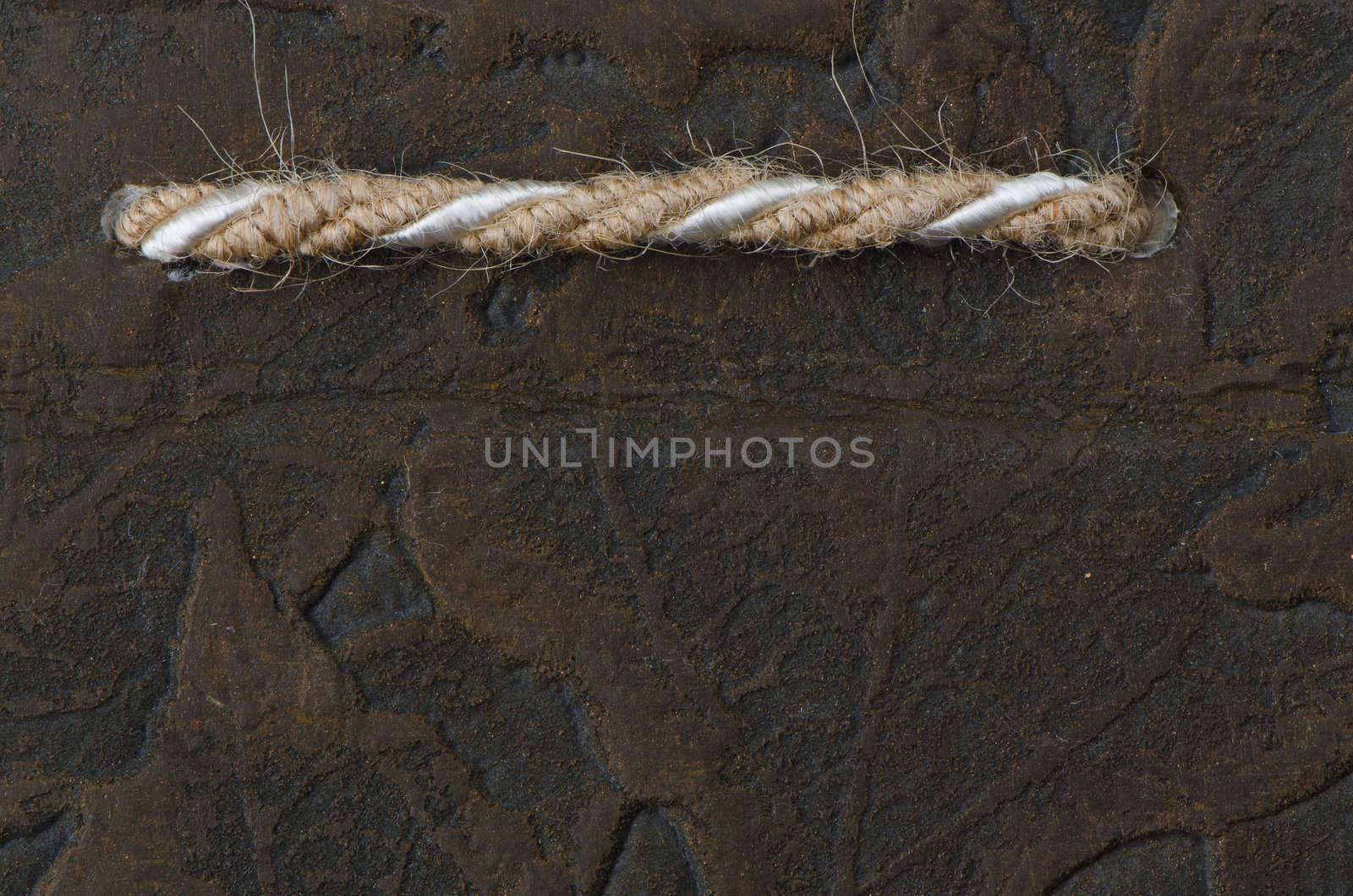 Brown synthetic leather detailed texture.
