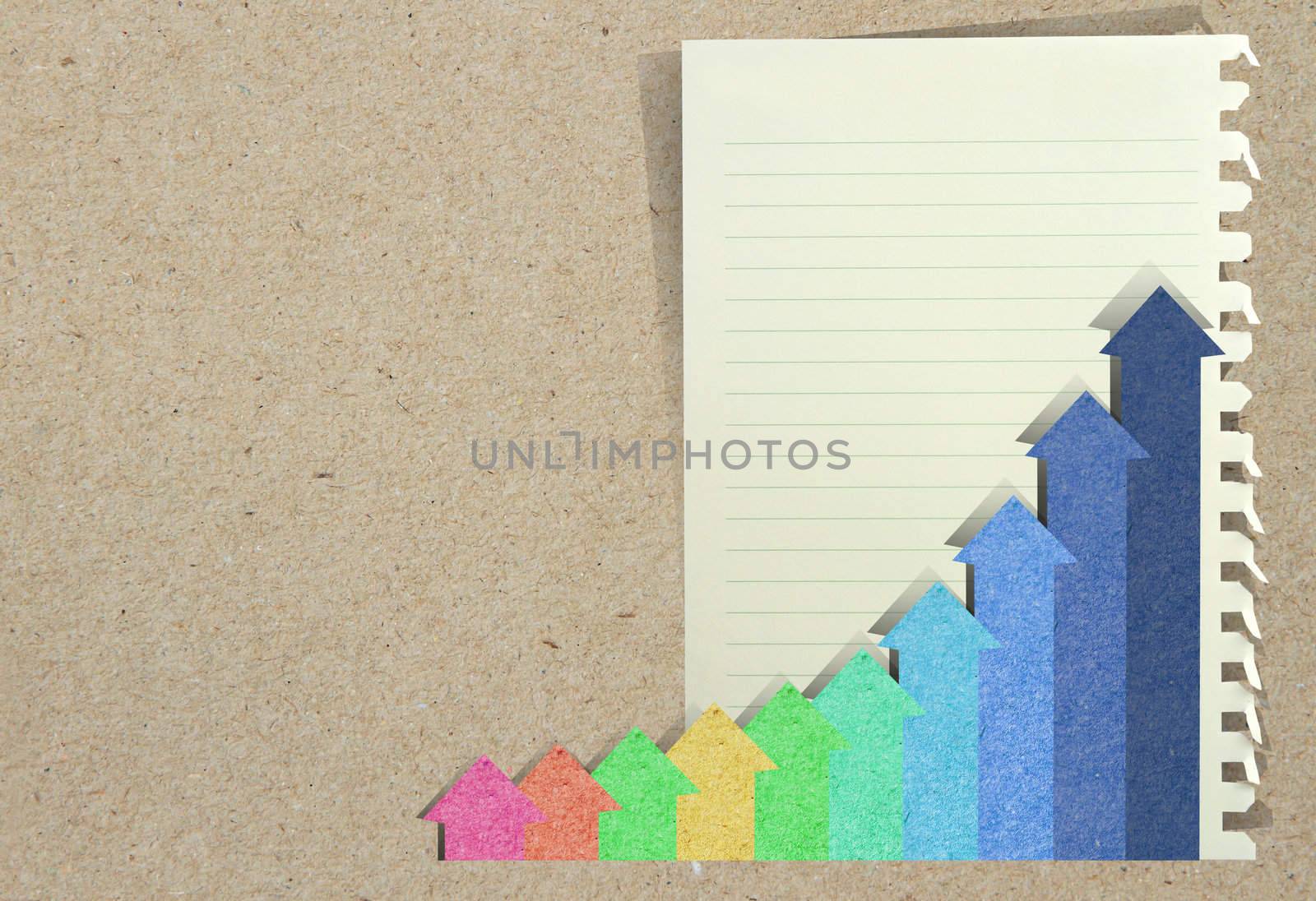 Conceptual Business charts with staple recycled paper craft stick
