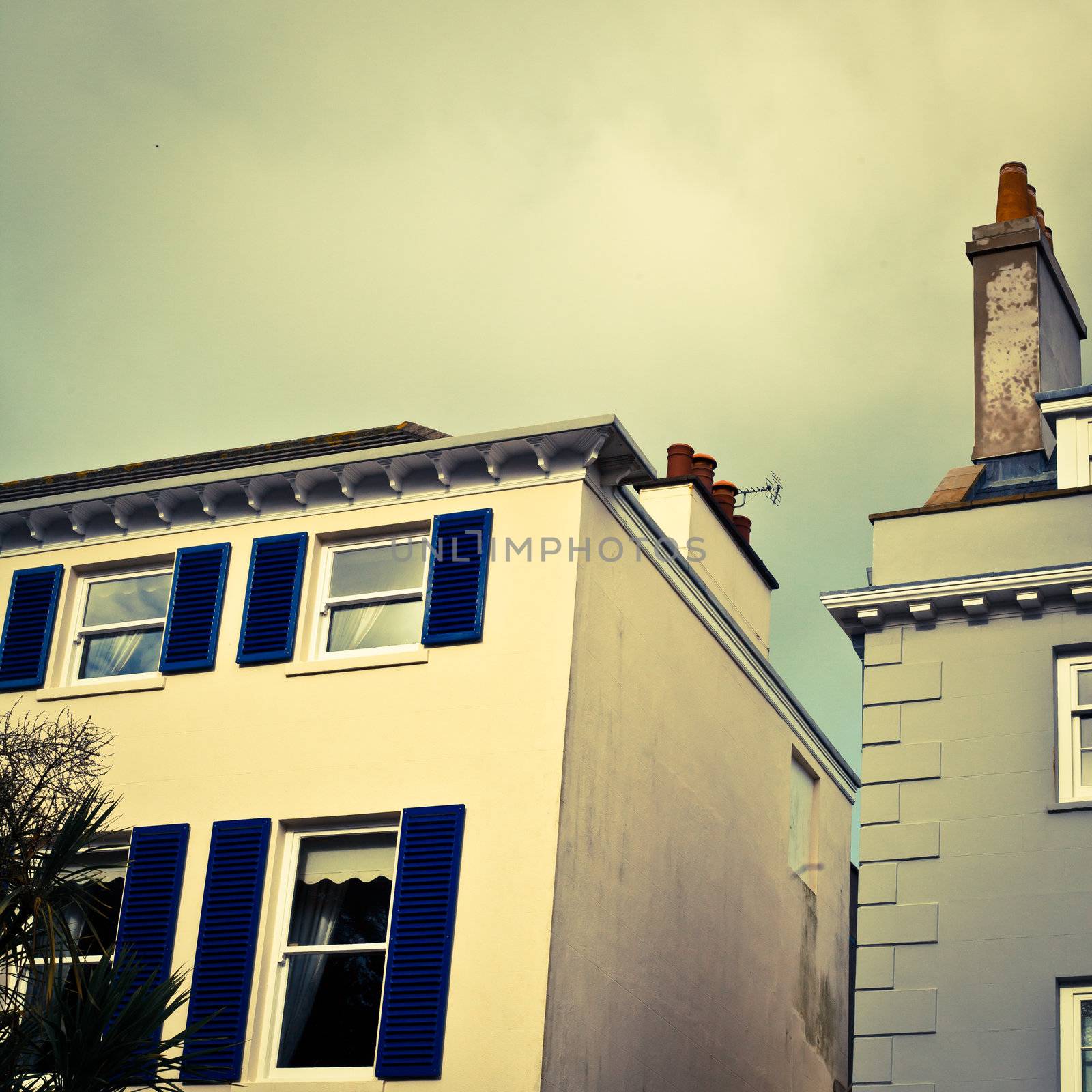 Guernsey town houses in soft retro tones