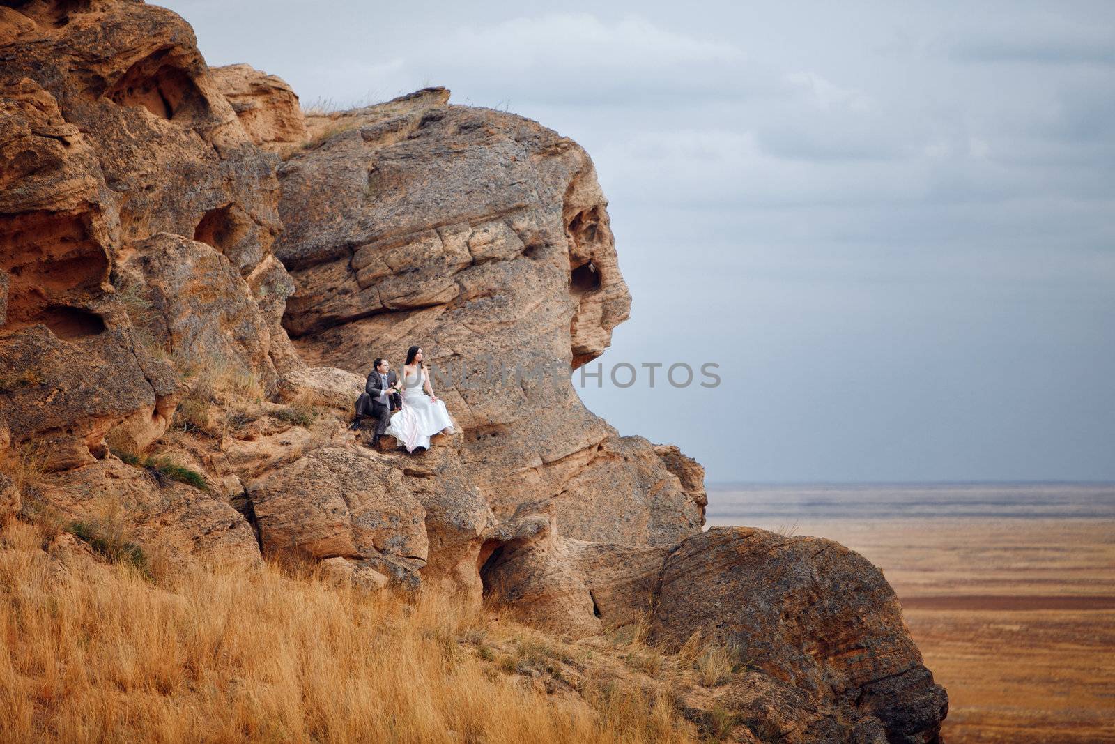 bride and groom on the mountain