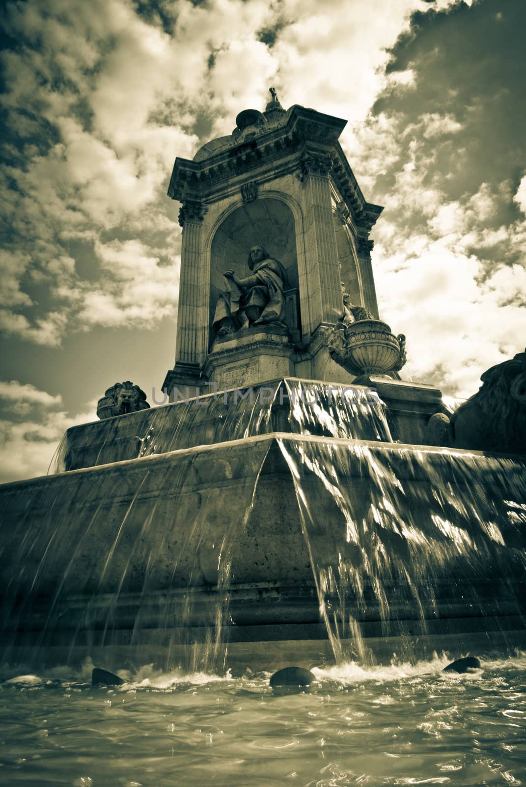 fountain square in Paris, France. monochrome image