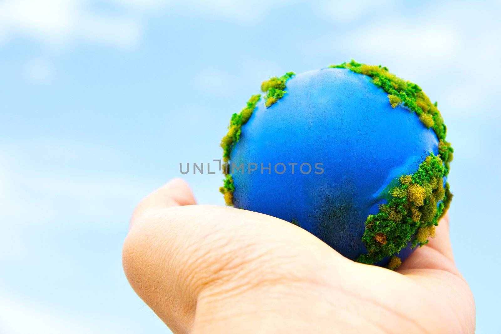 Hands and Earth. Concept Save green planet.