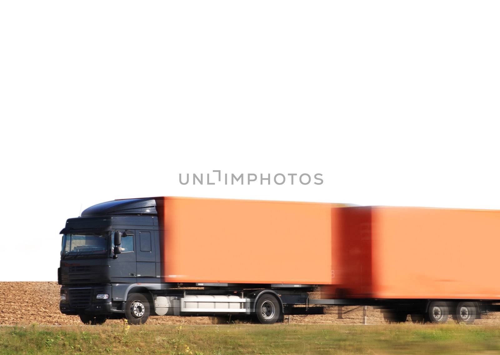 truck moving on a highway by photochecker